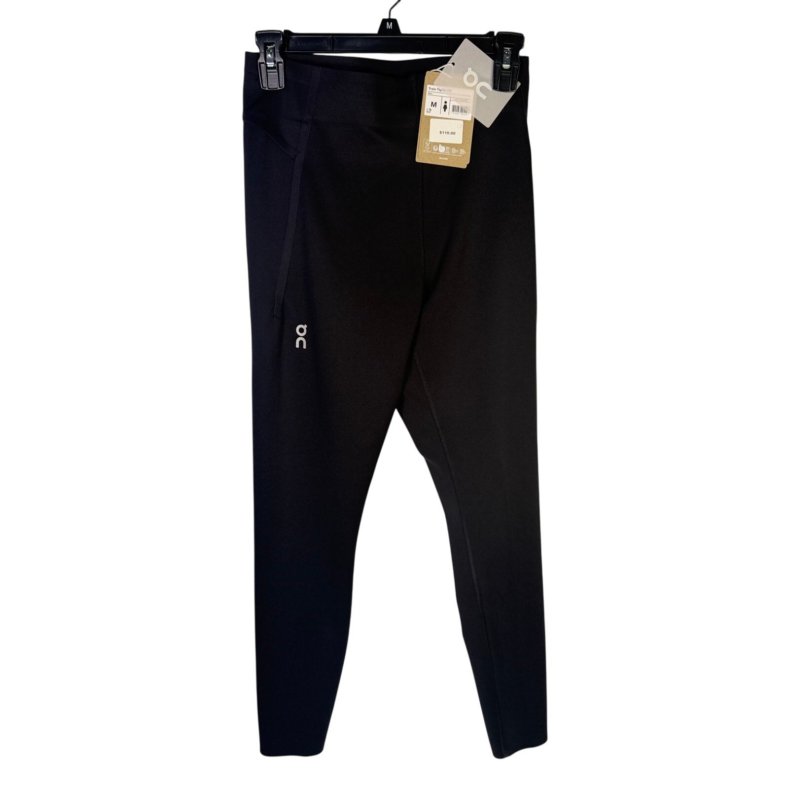 Black On Women’s Train Tights 7/8 leggings, size M, with comfortable fit and sleek design, shown flat on a white background.