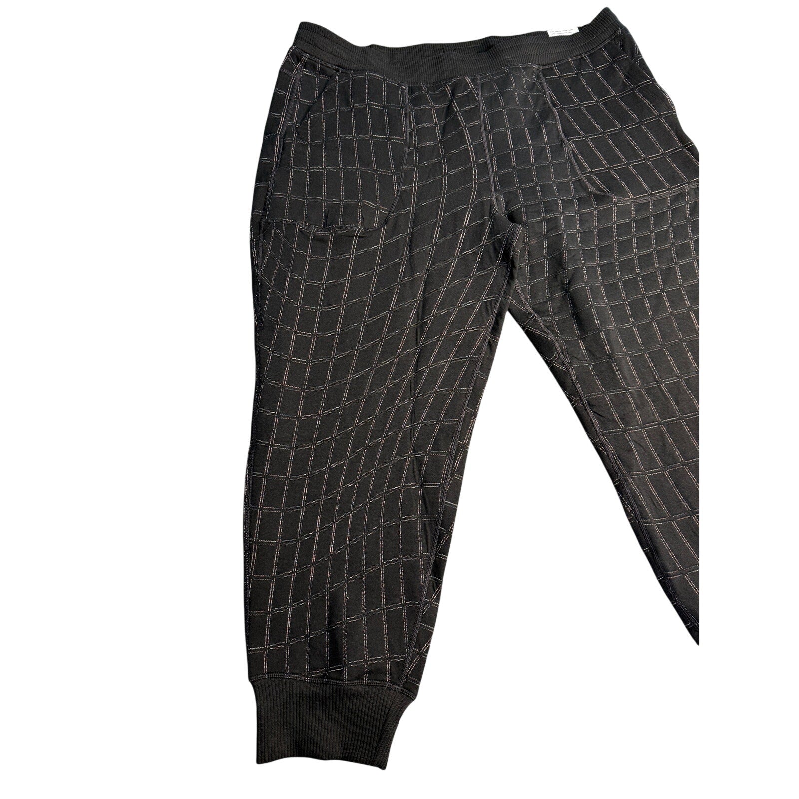 Black Nike Yoga Luxe Dri-FIT Grid jogger pants for women, XL size, shown on a model with a relaxed fit and comfortable design.