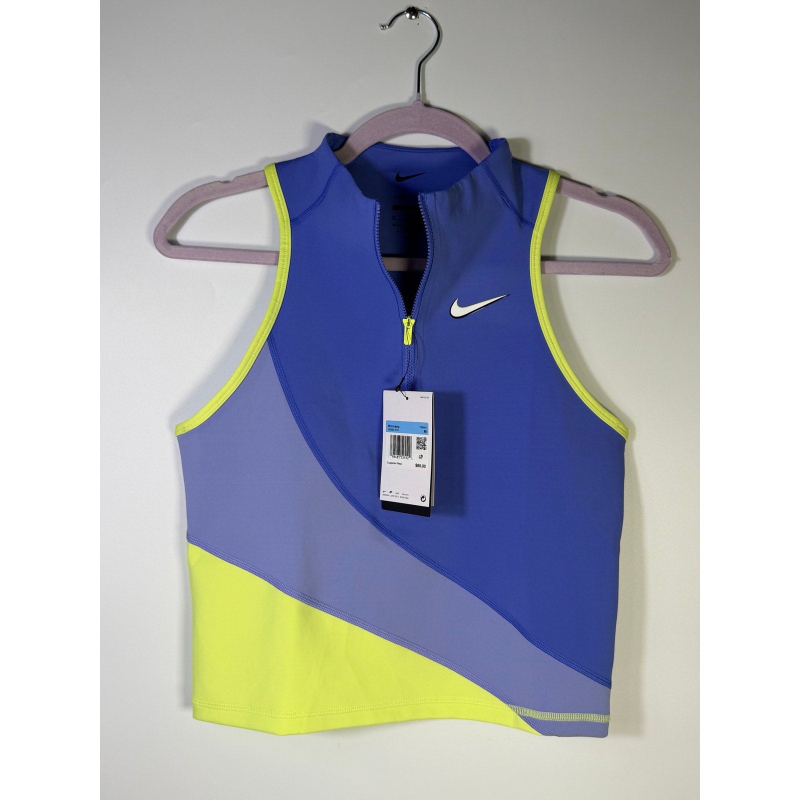 Nike women's sleeveless quarter-zip crop tank top in blue lime, size M, new with tags, featuring a sporty design and breathable fabric.