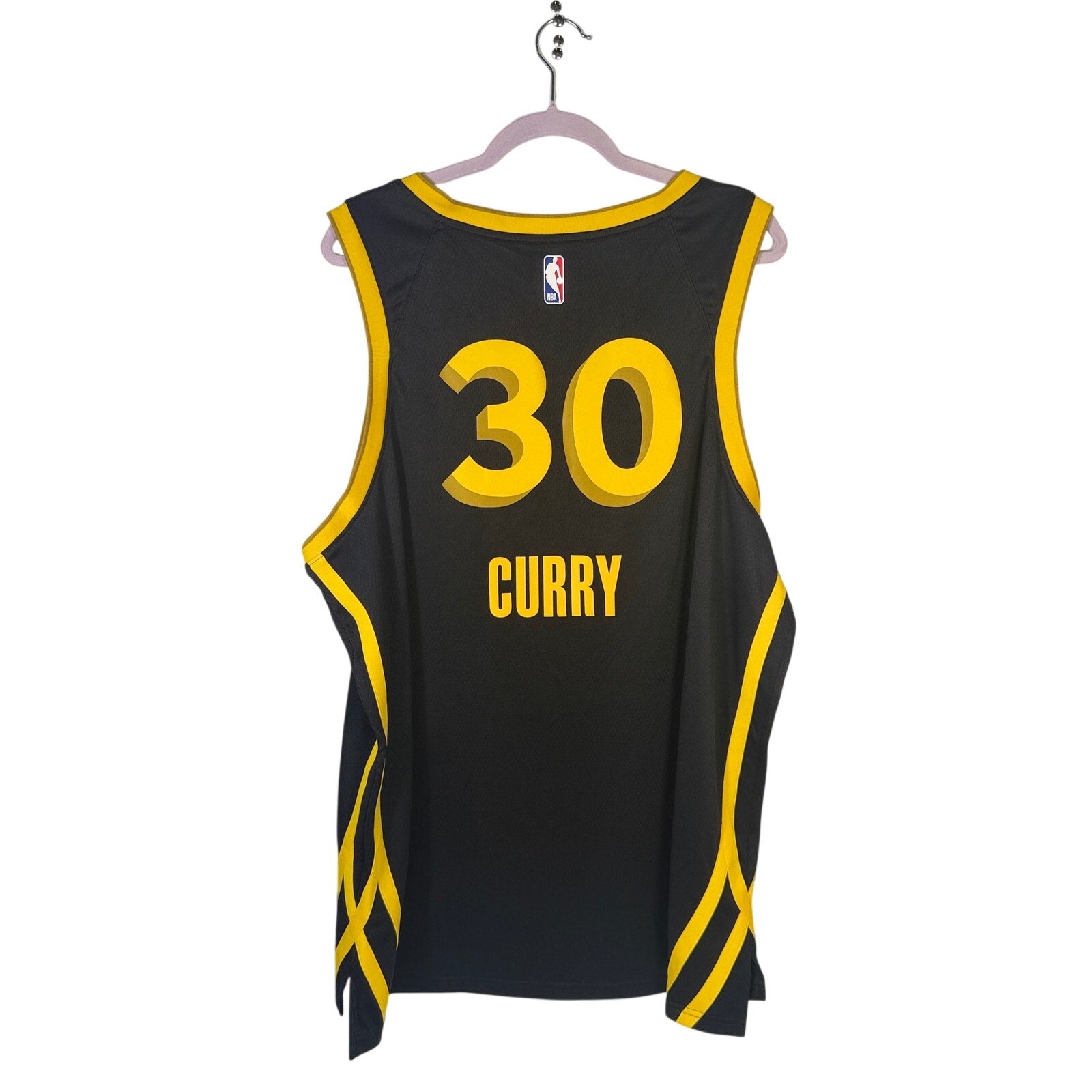 Nike Stephen Curry Golden State Warriors men's XXL black and yellow swingman basketball jersey, front view.