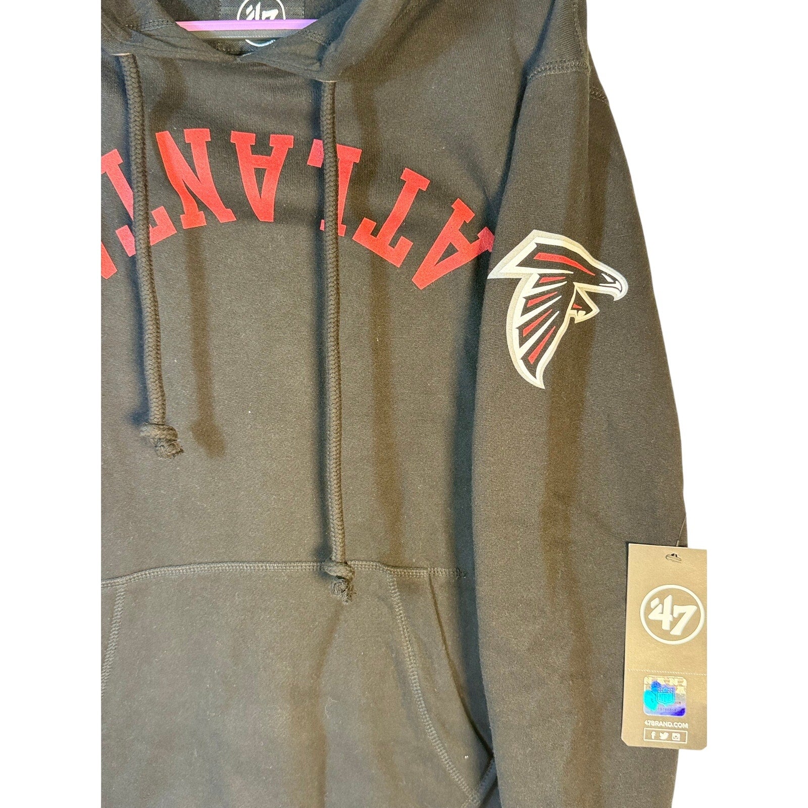Black men's 47 Brand Atlanta Falcons hoodie with NFL fleece lining, pullover style, size small, hooded sweatshirt.