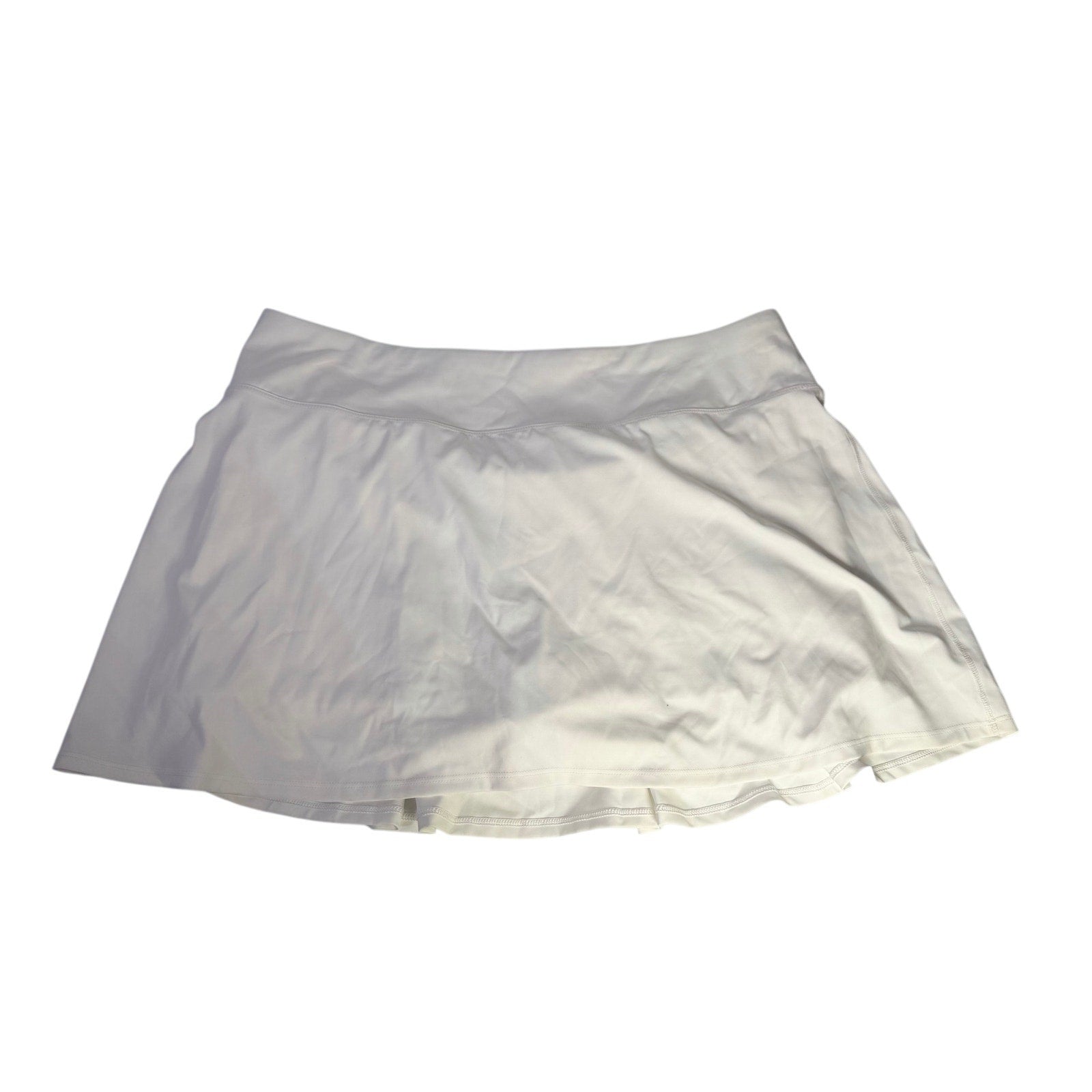 White CALIA Women’s Court Collection high-rise 14-inch skort in size XL, featuring a sleek athletic design and comfortable fit.