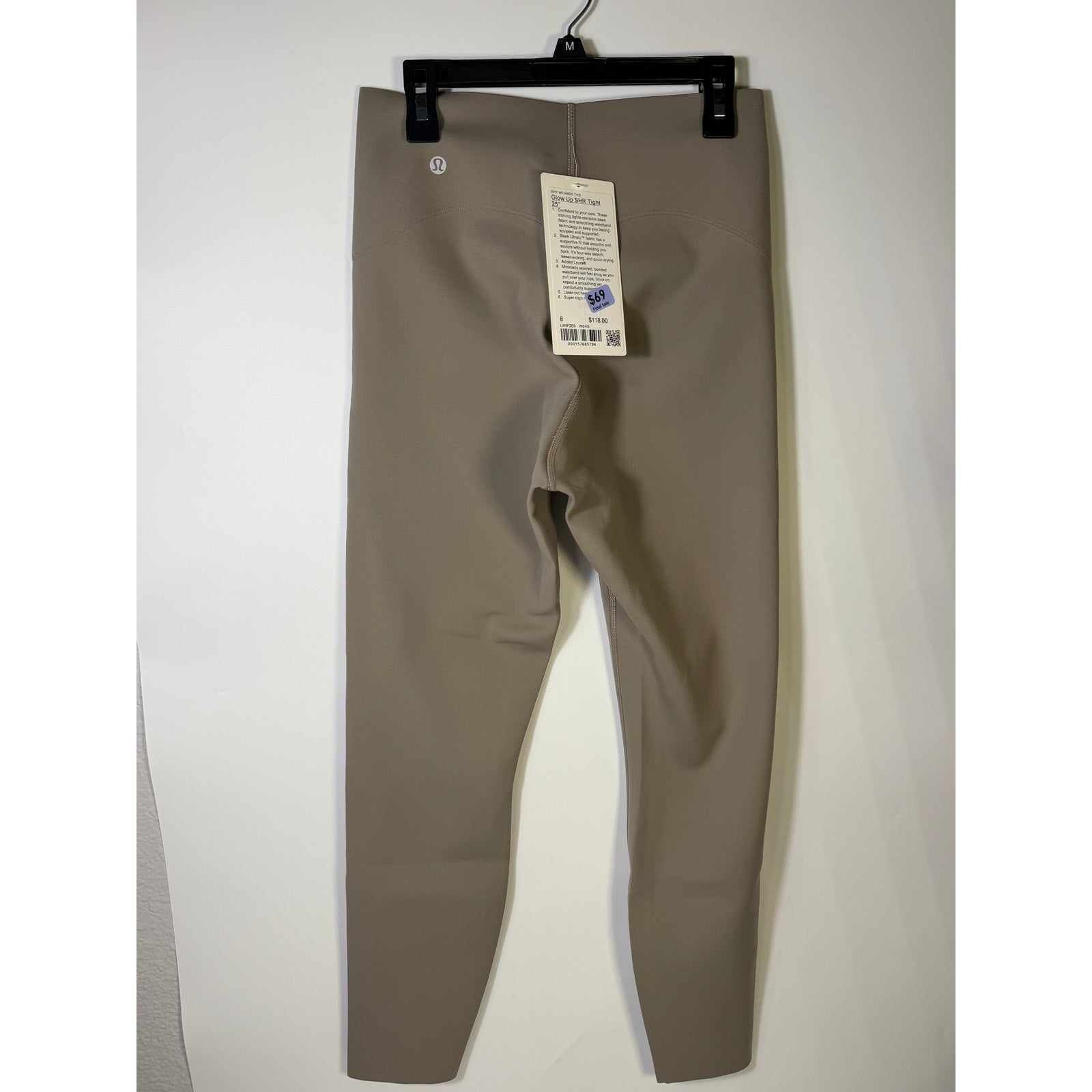 Lululemon Glow Up super-high-rise taupe gray leggings in size 8, showing the snug fit and stretchy fabric.