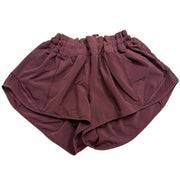 Lululemon women's burgundy running shorts size 8 with lining, athletic shorts for active wear, shown on a white background.