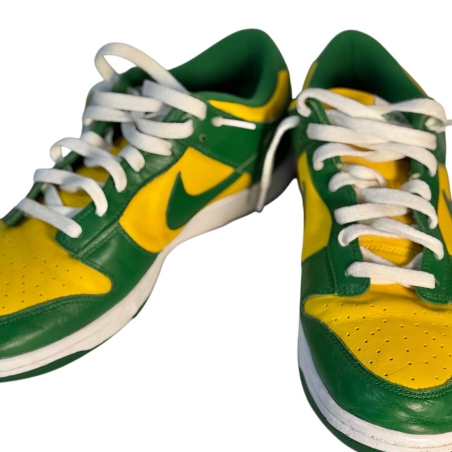 Nike Dunk Low Brazil sneakers in green and yellow leather, men's size US 11, featuring Nike branding and stylish sneaker design.