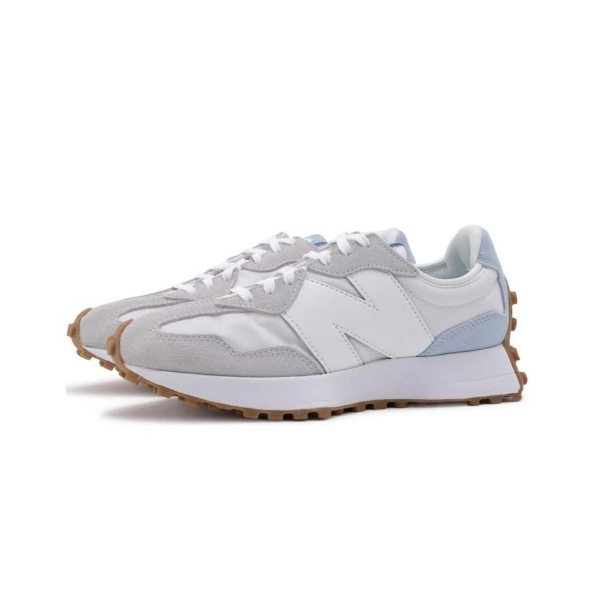 New Balance 327 women's sneakers in Reflection Bright Grey, showing side view with white sole and stylish design.