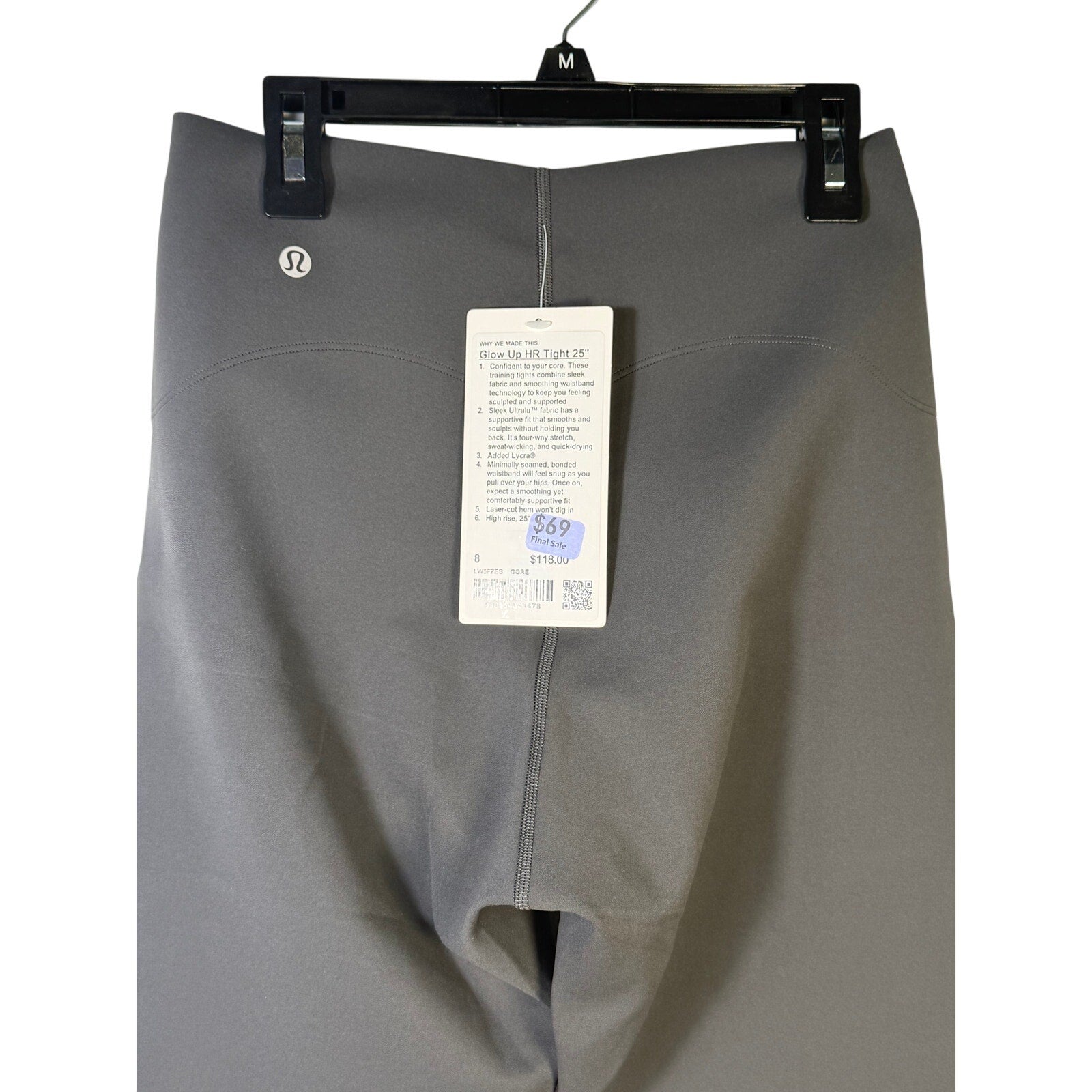 Lululemon Glow Up high-rise leggings in graphite grey, size 8, with a close-up of the form-fitting design and stretchy fabric.