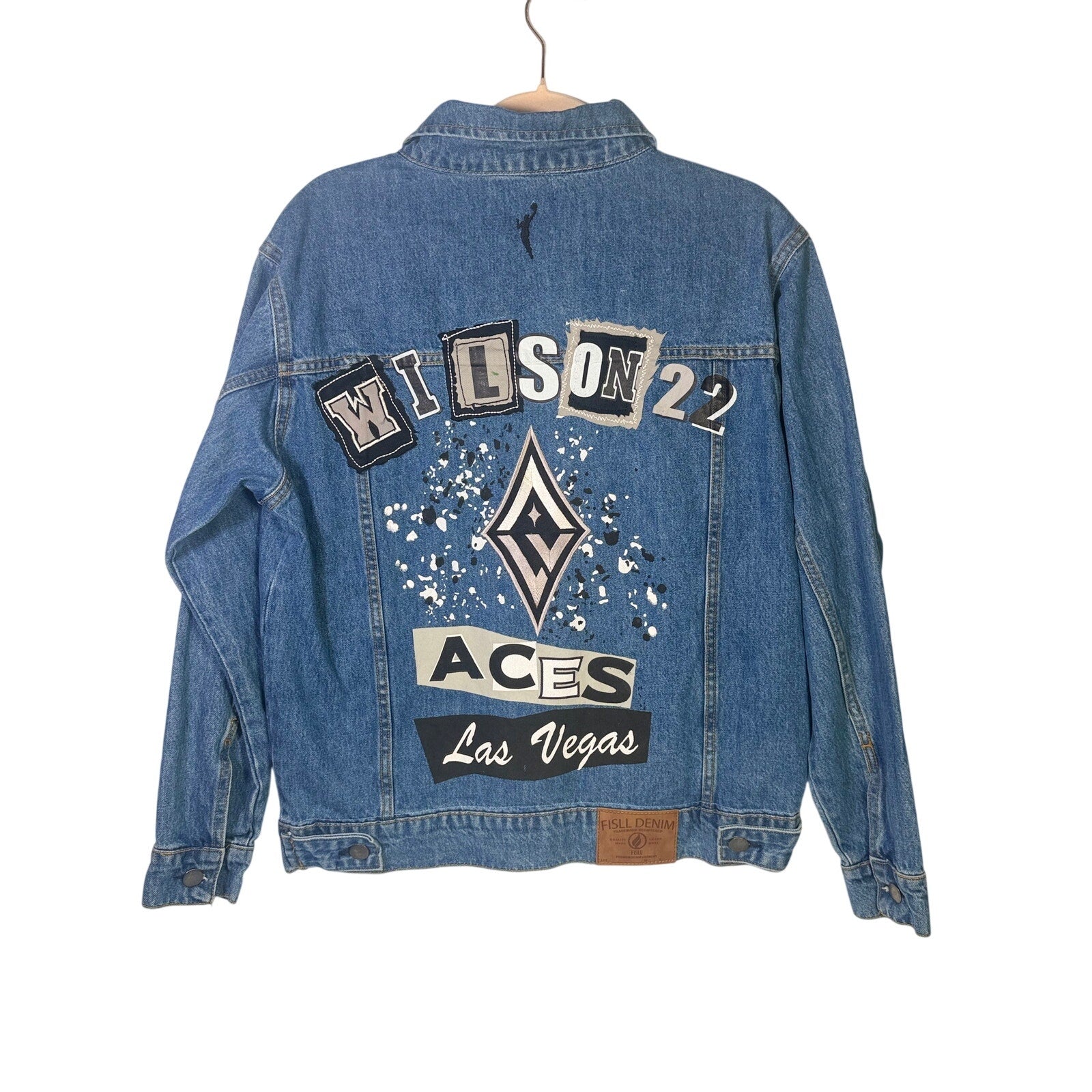 FISLL Las Vegas Aces Wilson denim jacket in unisex medium, featuring team logo and classic blue denim fabric.