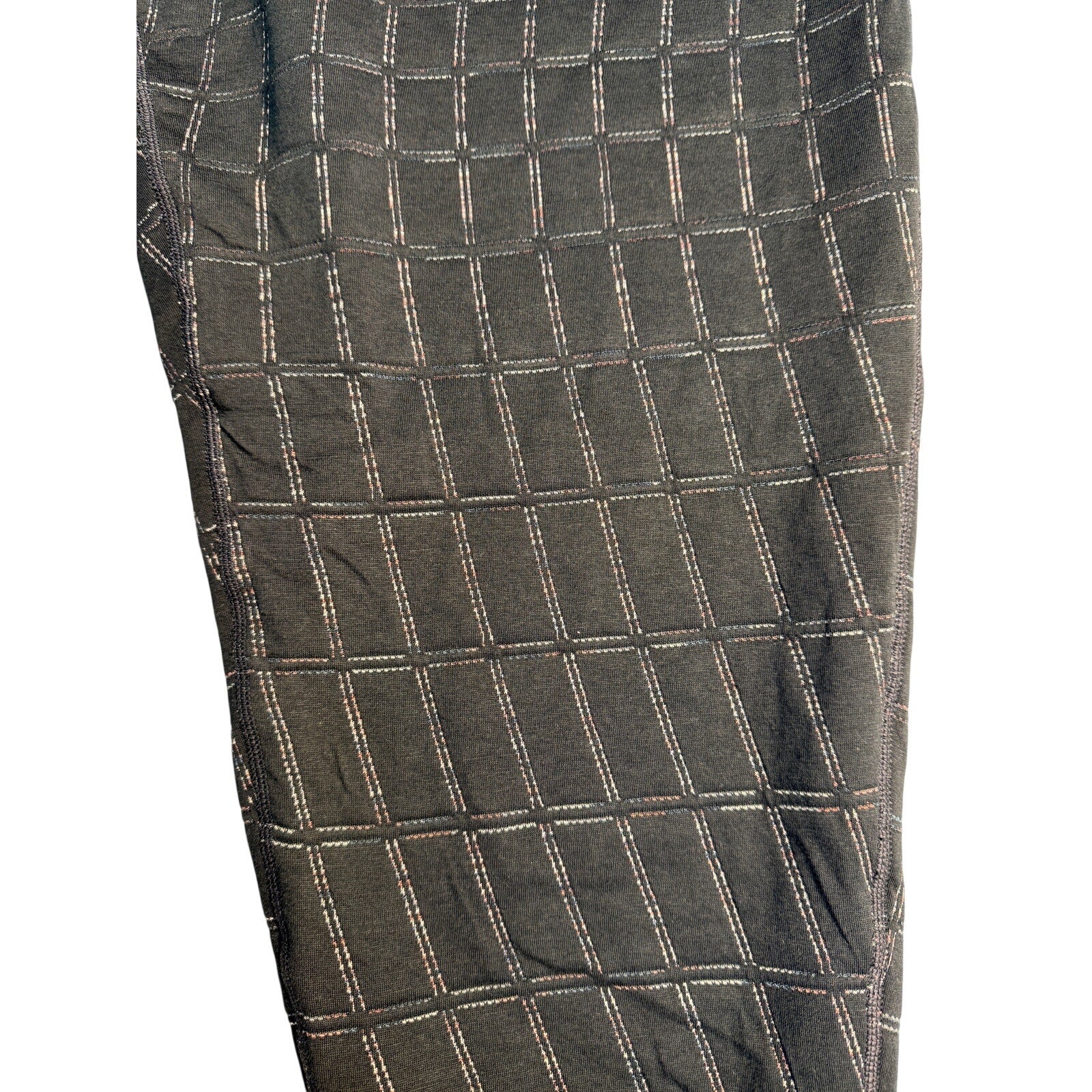 Nike Women’s black Yoga Luxe Dri-FIT Grid jogger pants, XL size, showing the relaxed fit and comfortable fabric.