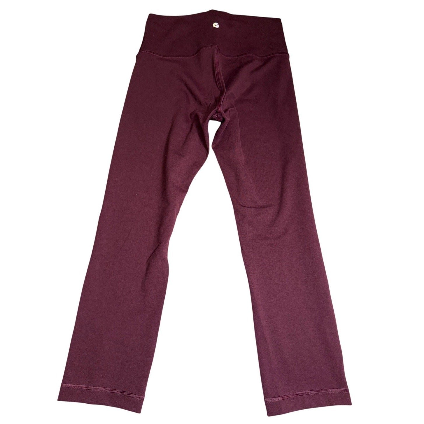 Lululemon women's burgundy high-rise flared yoga leggings, size 6, showing the fitted waist and flared leg design.