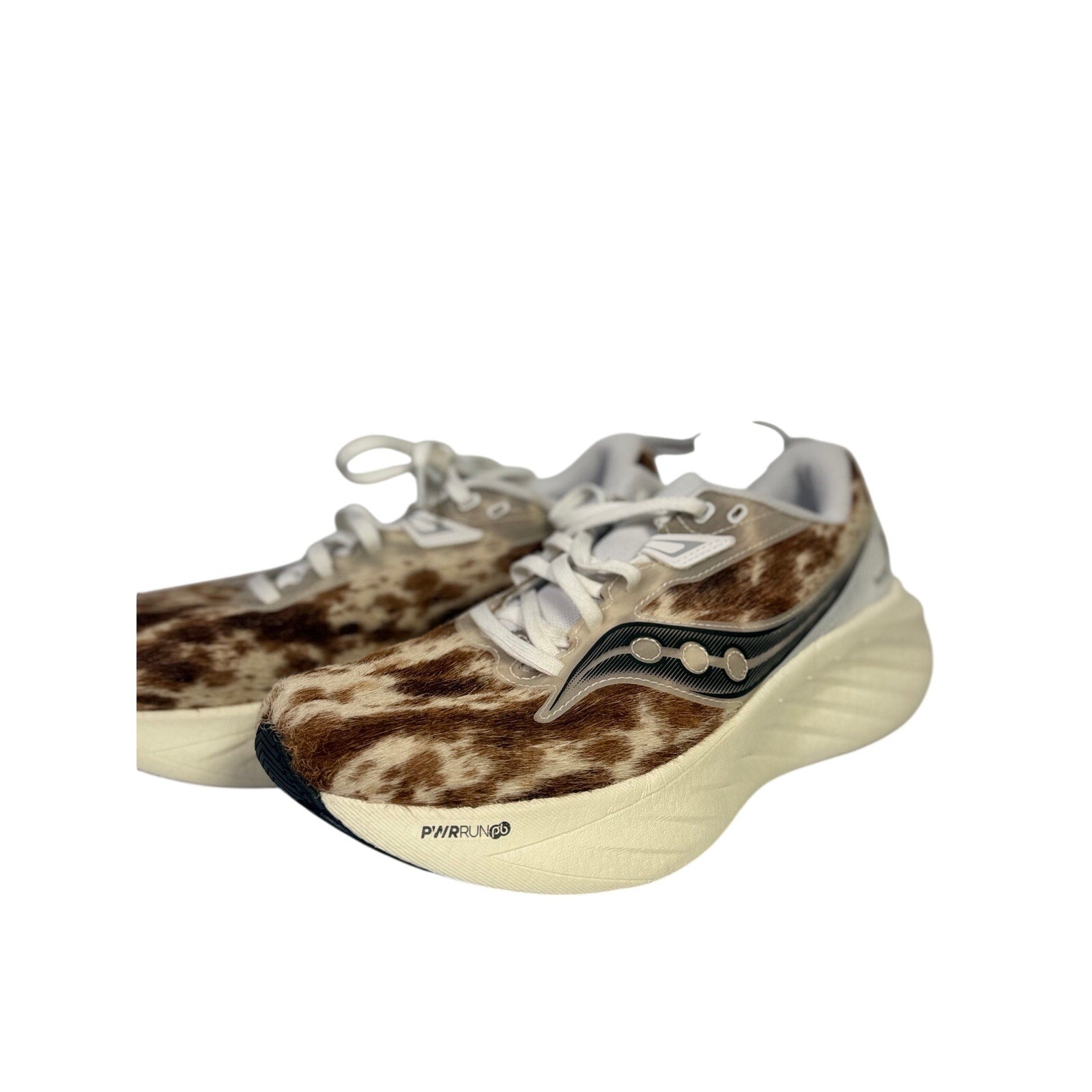 Saucony Women’s Endorphin Shift 3 Runshield cow print athletic running shoes size 9 with textured black and white design.