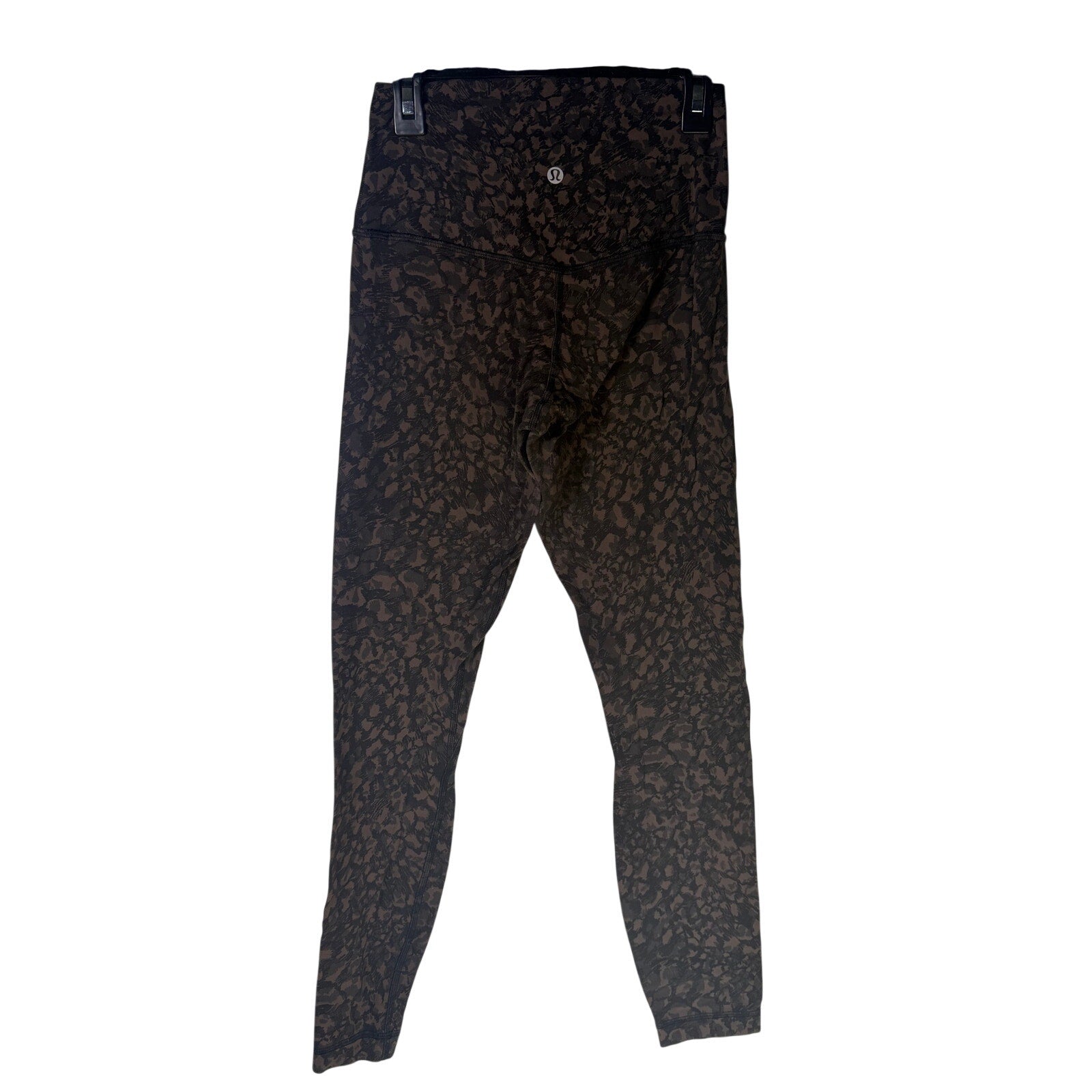 Lululemon women’s Align high-rise leggings in brown and black camo, 25-inch length, size 4, shown on a model.