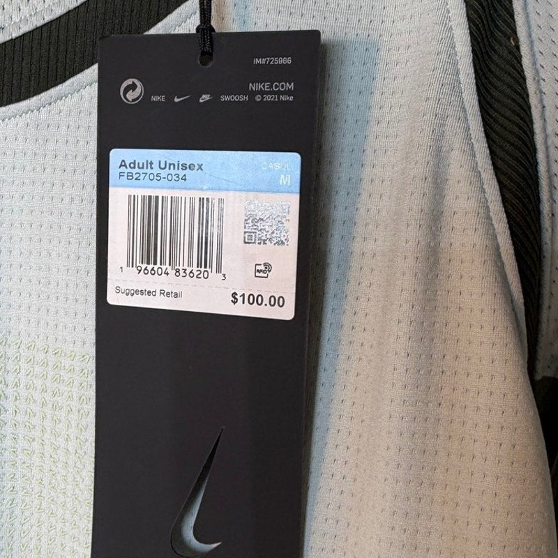 Men's Nike Dri-FIT ISPA long sleeve training shirt, lightweight athletic top with moisture-wicking fabric, in a men's medium size.
