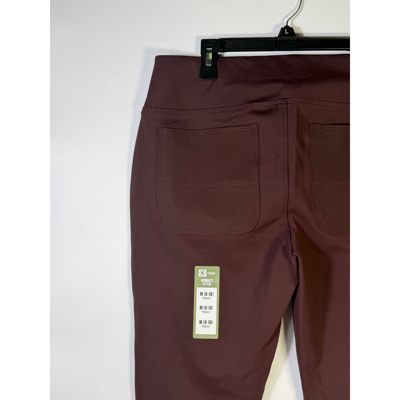 Carhartt Force women's fitted utility pants in size M 8-10, regular brown, featuring durable fabric and functional design.
