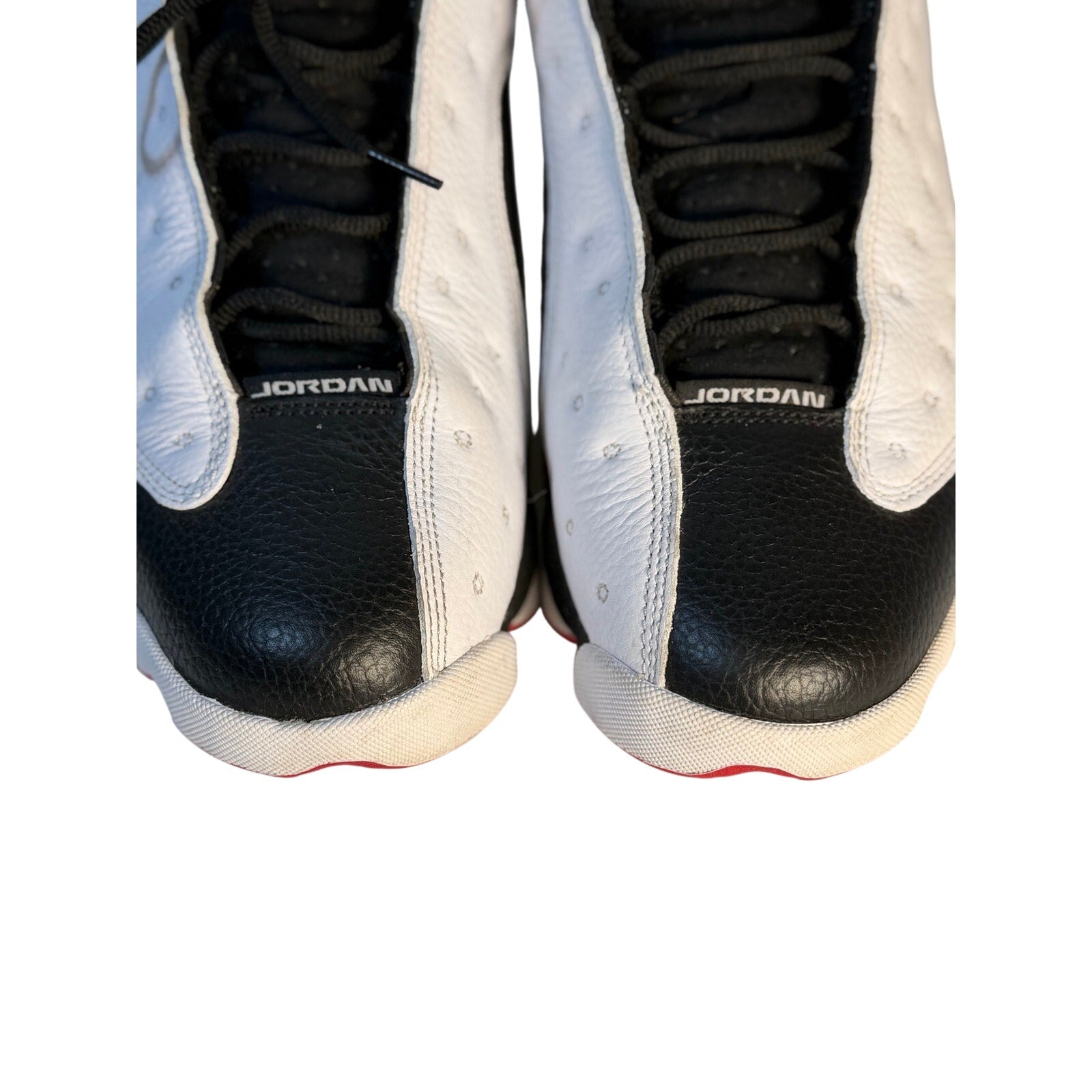 Men's Air Jordan 13 Retro He Got Game black and white athletic sneakers, size US 11.5, with signature Jordan design details.