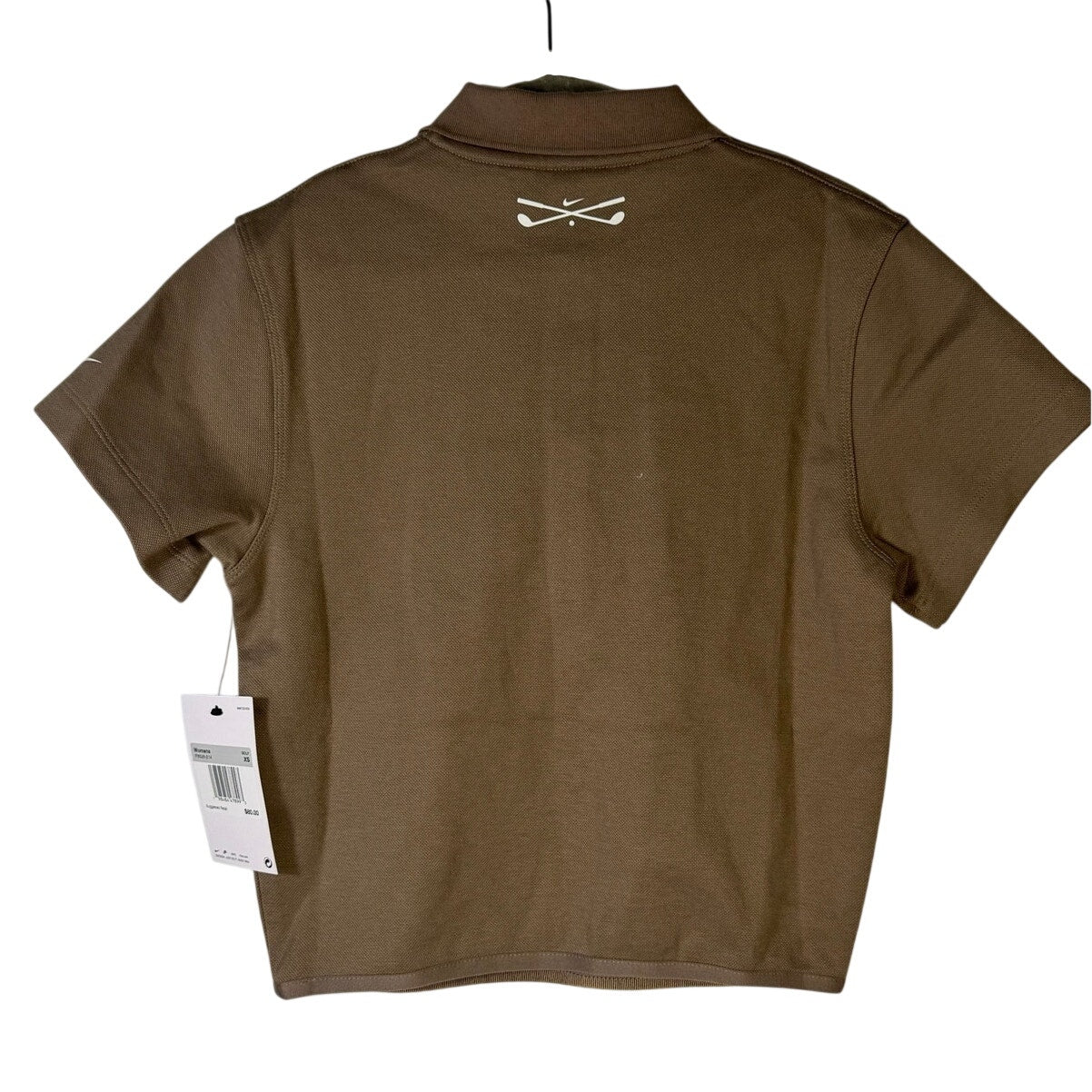 Nike women’s short-sleeve golf polo in mink brown, size XS, featuring a classic polo collar and athletic fit.