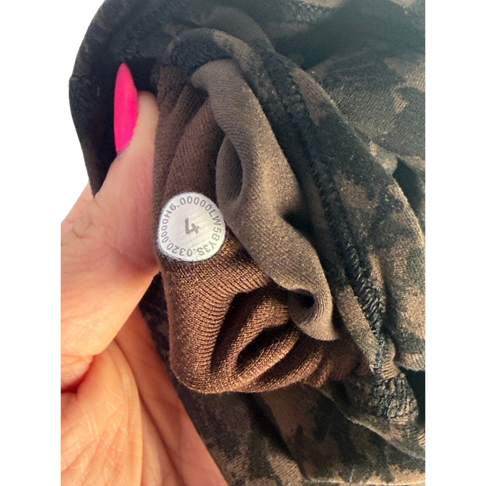 Lululemon women’s Align high-rise leggings in brown and black camo, 25-inch length, size 4, shown on a model.