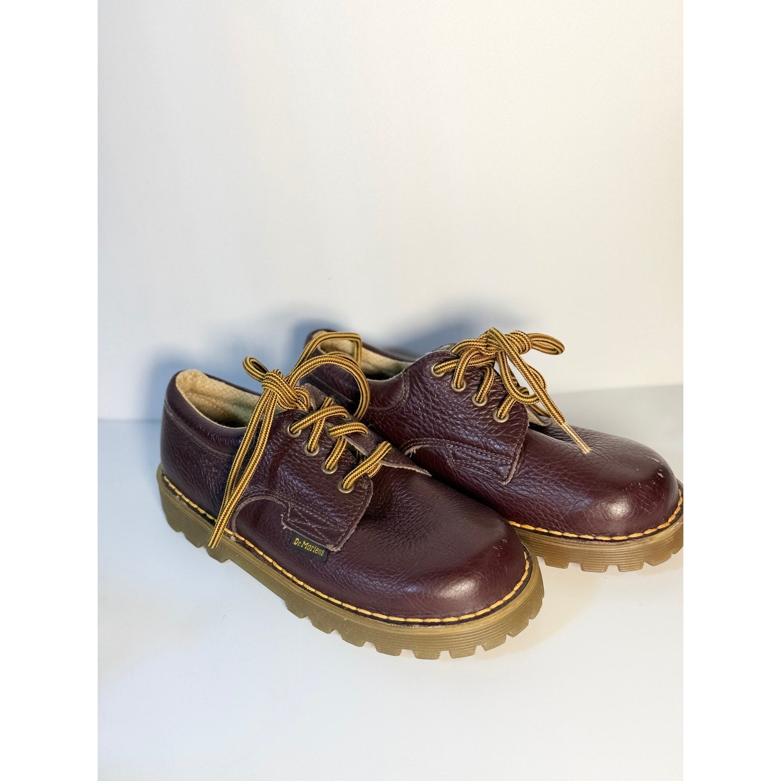 Dr. Martens oxblood leather 3-eye Oxford boots for women, UK 5 / EU 38, featuring classic lace-up design and sturdy sole.