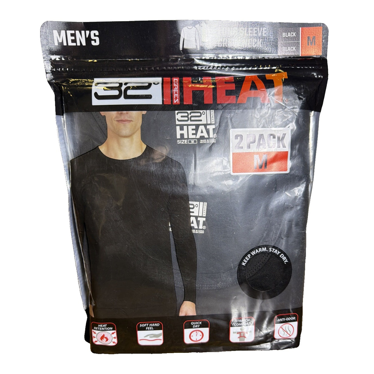 Two black 32 Degrees Heat men's long sleeve crew base layer tops in size M, displayed flat on a white background.