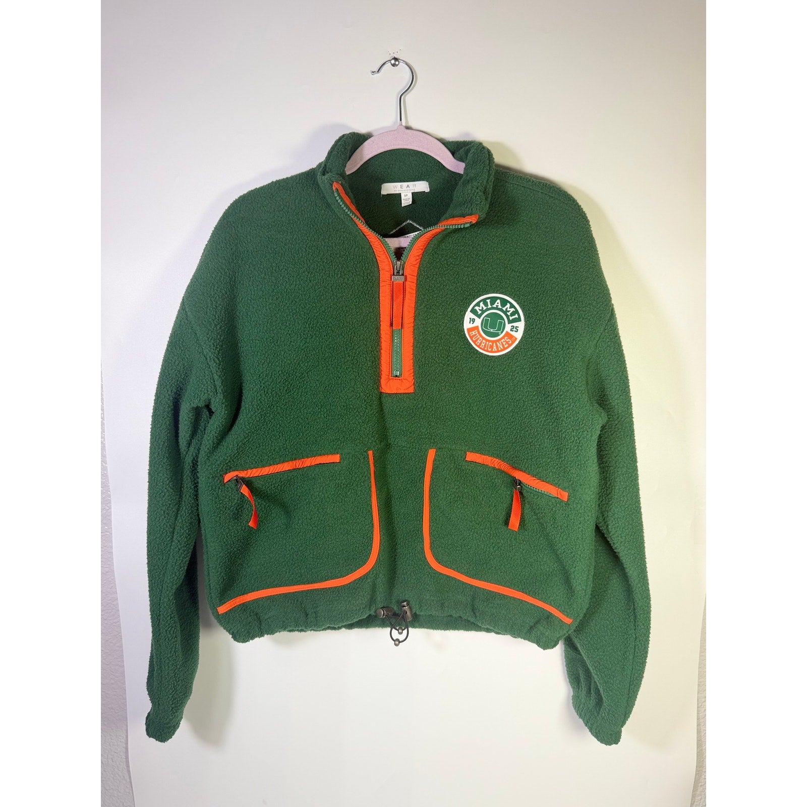 Wear by Erin Andrews women's Miami Hurricanes green quarter-zip fleece sweatshirt, size small, with team logo and cozy fabric.