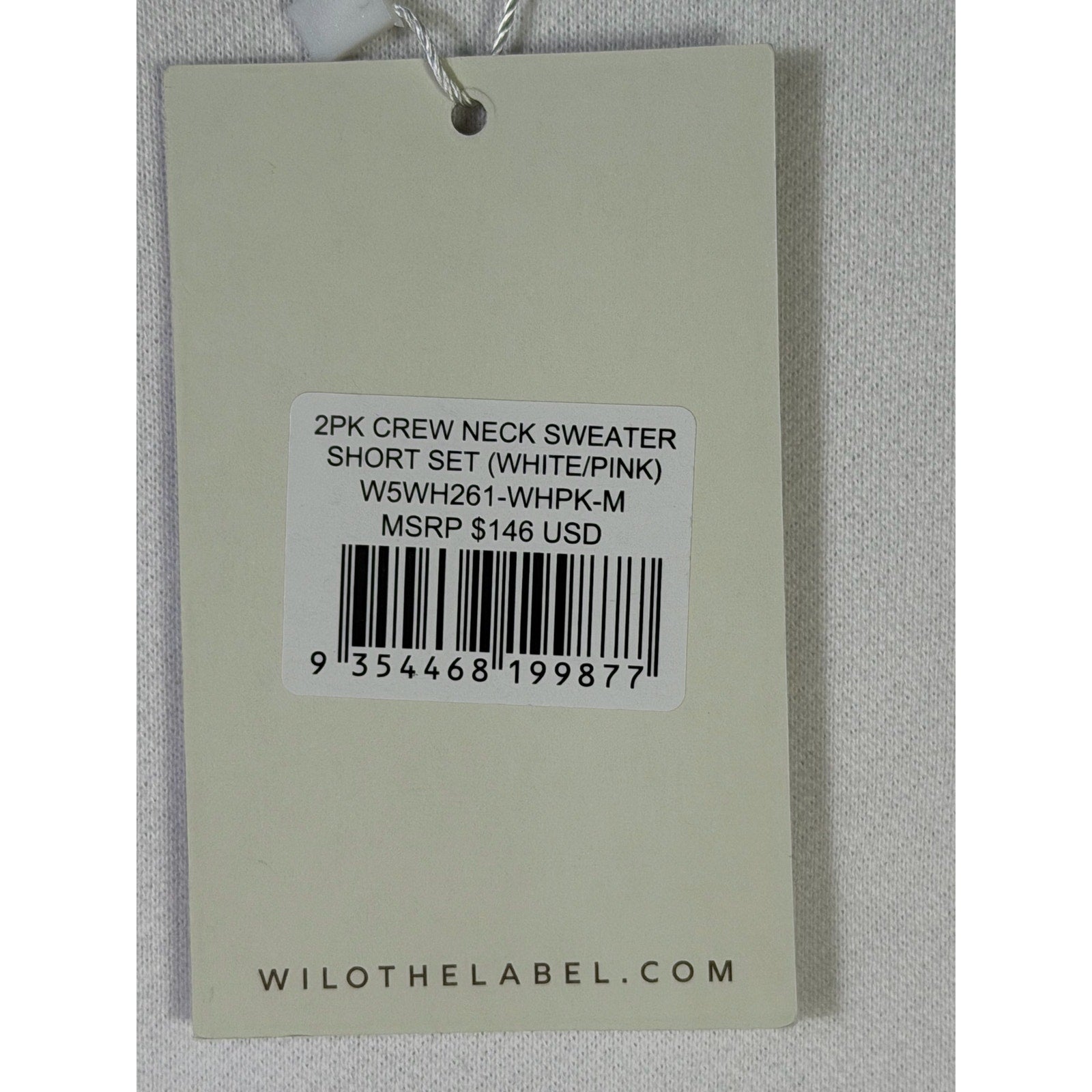 WILO The Label Sports & Wellness Club crewneck sweatshirt in white with pink accents, medium size, front view.