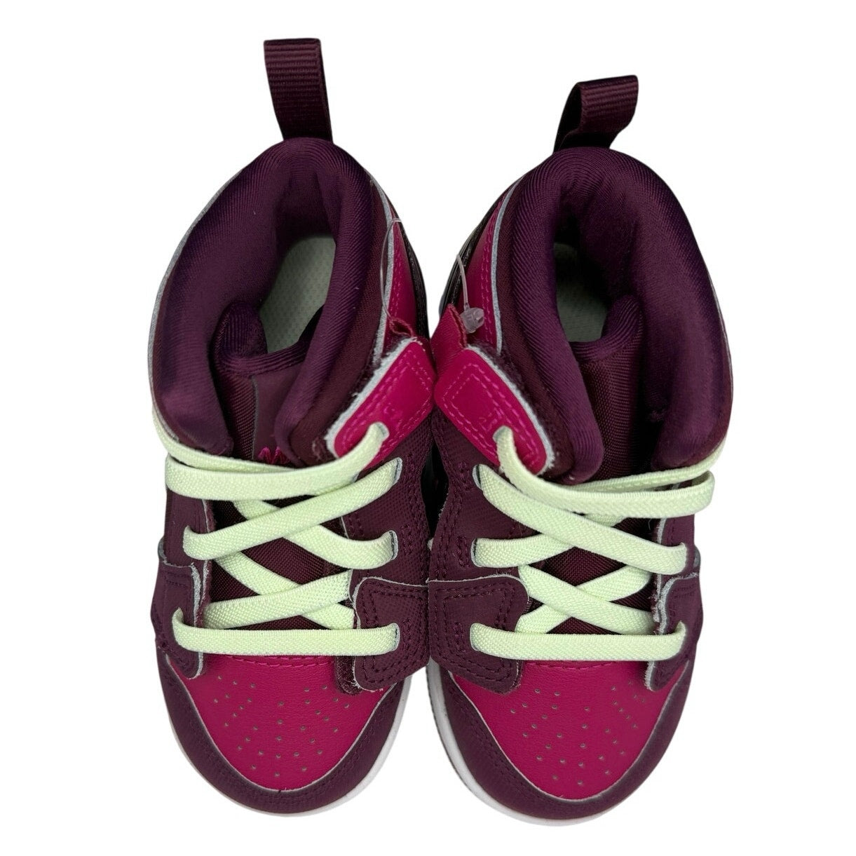 Air Jordan 1 Mid RM EasyOn toddler sneakers in Bordeaux, pink, and white with velcro straps for easy wear.