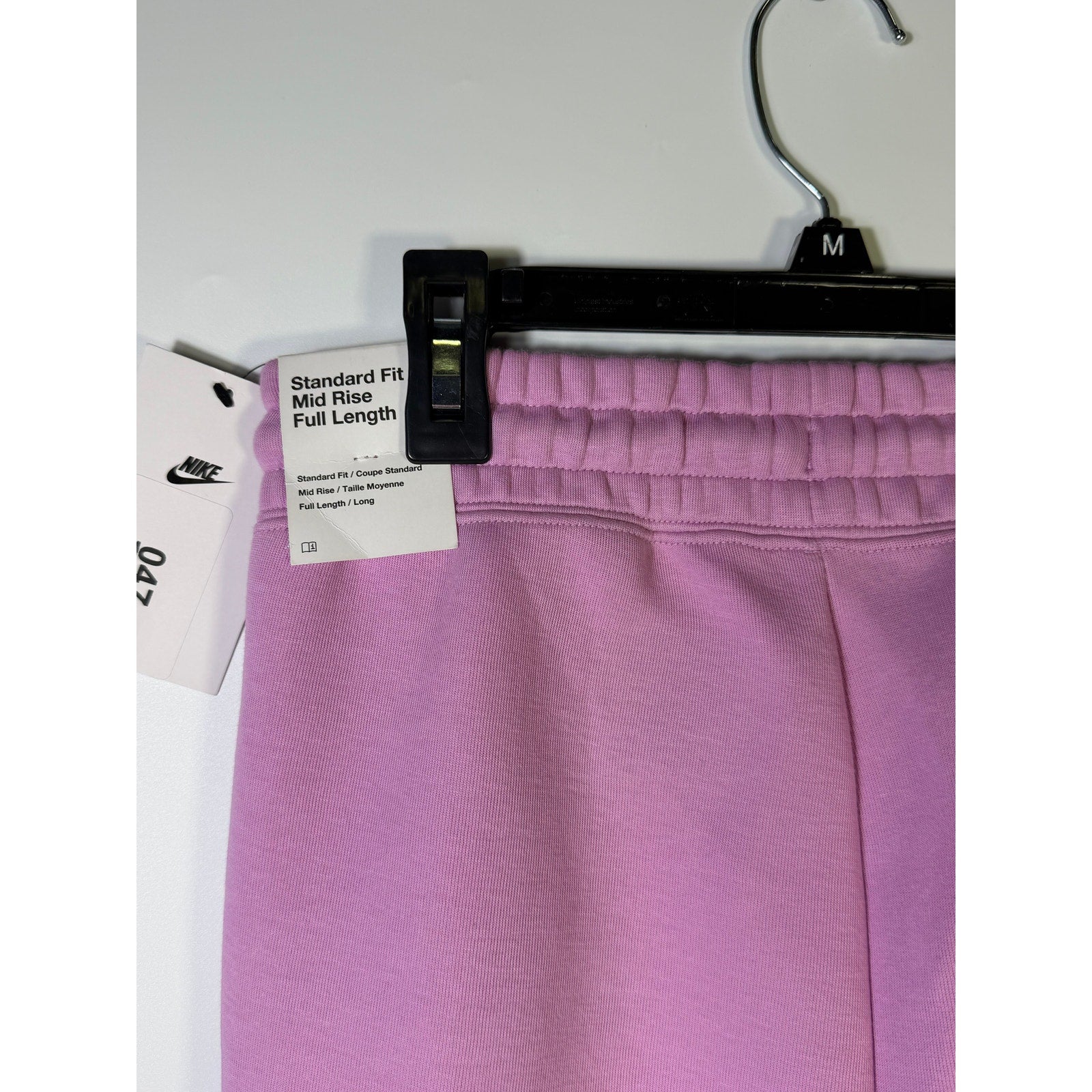 Pink Nike Sportswear Phoenix fleece jogger sweatpants for women, XS size, mid-rise, soft fabric, relaxed fit, new with tags.