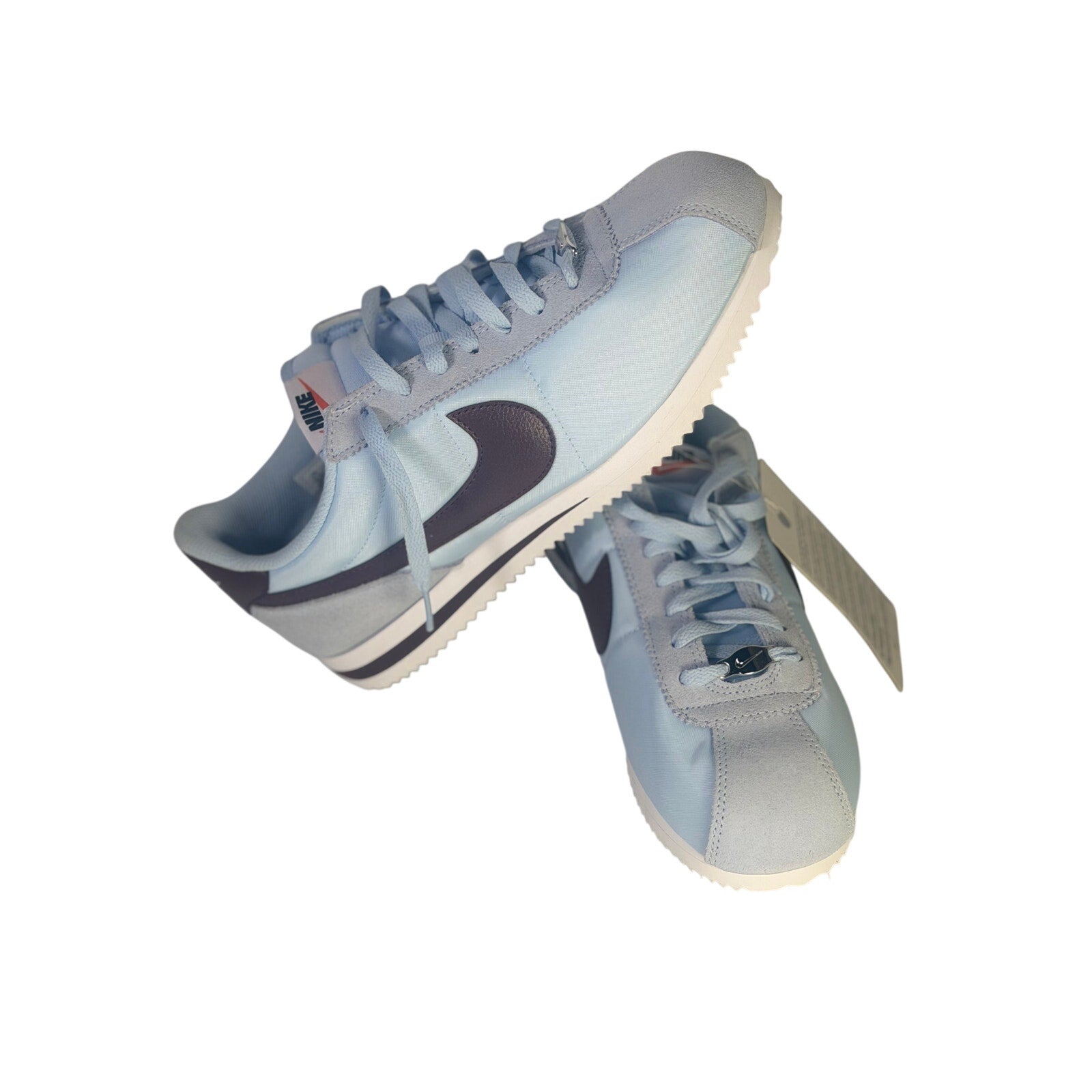 Light blue and burgundy Nike Classic Cortez nylon men's sneakers, size 8.5, featuring a sleek design and iconic branding.