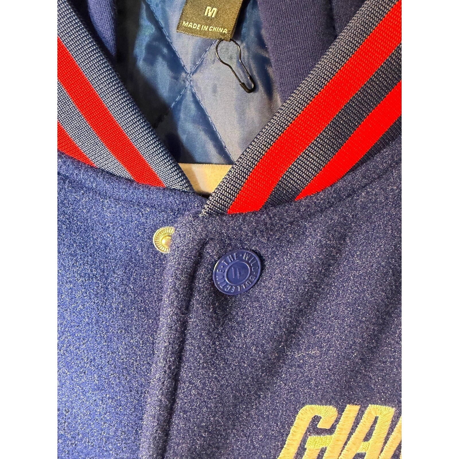 Men's NFL New York Giants varsity jacket with team logo, featuring a classic design and varsity style in medium size.