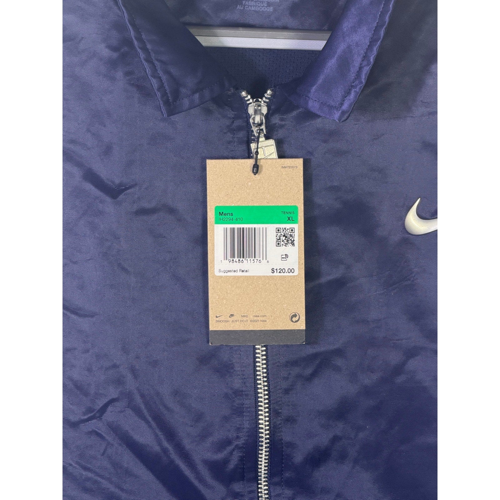 Nike men's navy blue full zip running jacket, lightweight, size XL, with visible front zipper and Nike logo.