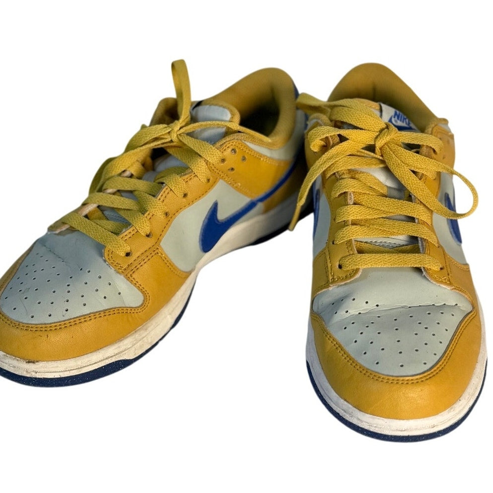 Nike Dunk Low GS sneakers in white leather with university gold and game royal accents, youth size US 6Y.