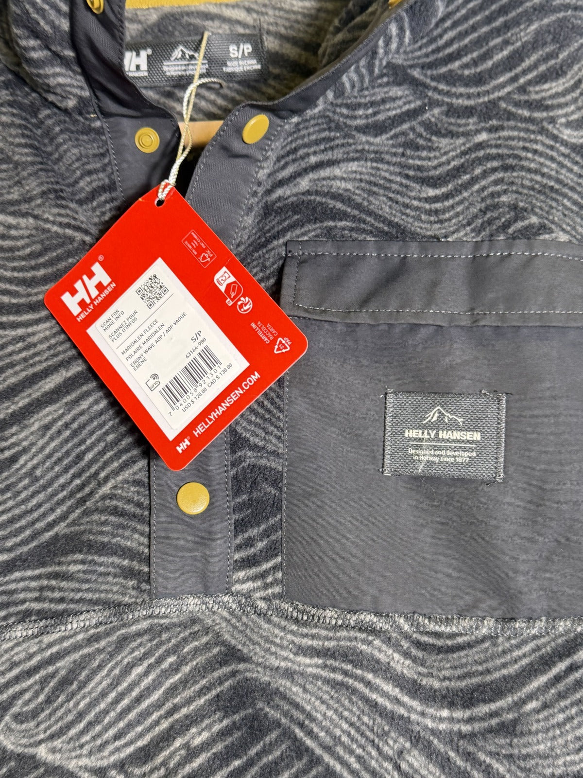 Helly Hansen Maridalen fleece pullover for men in size S, ebony wave print, featuring a comfortable sweatshirt design.