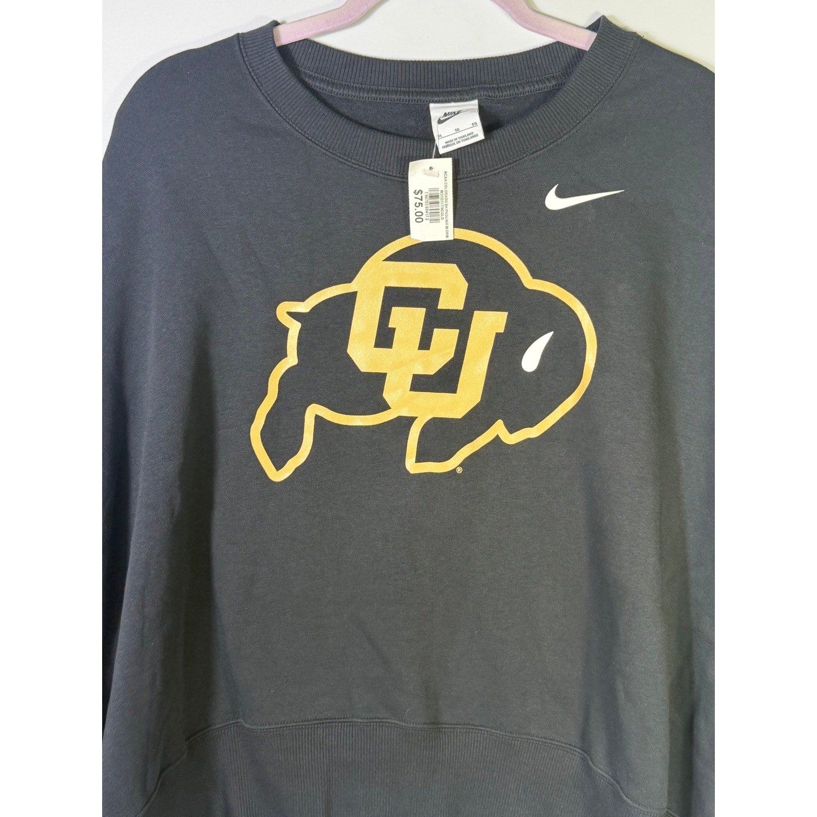 Nike women's Colorado Buffaloes oversized black crewneck sweatshirt, size XL, soft fabric and relaxed fit.