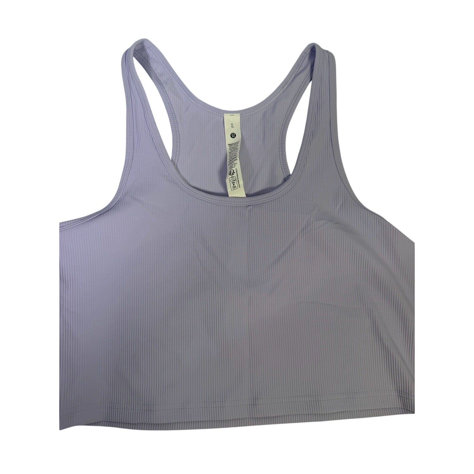 Lululemon Power Pivot training tank top in Lavender Frost, size XL, showing the fitted athletic design and soft fabric texture.