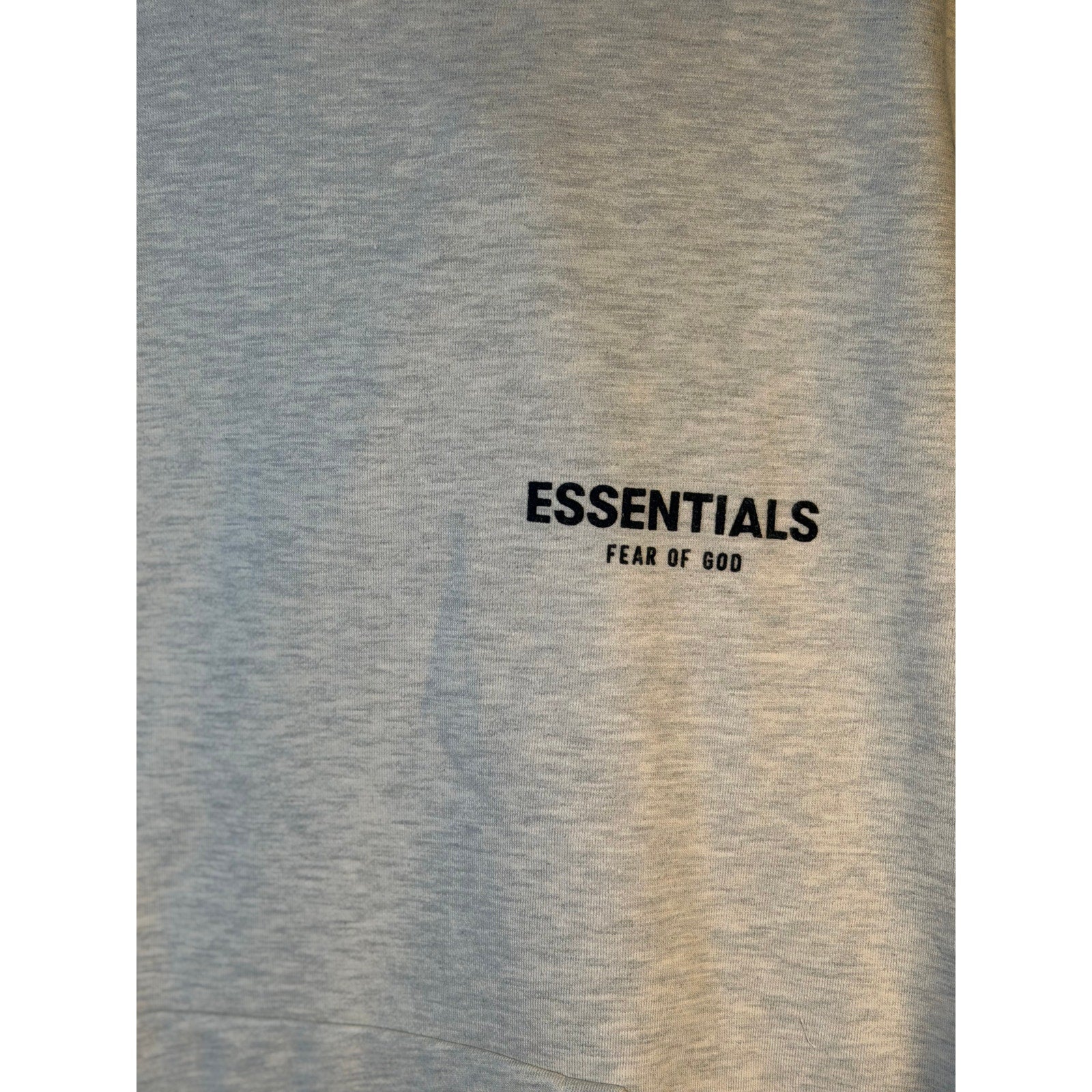 Fear of God ESSENTIALS men's light oatmeal pullover hoodie with logo, casual sweatshirt, cozy and stylish for everyday wear.
