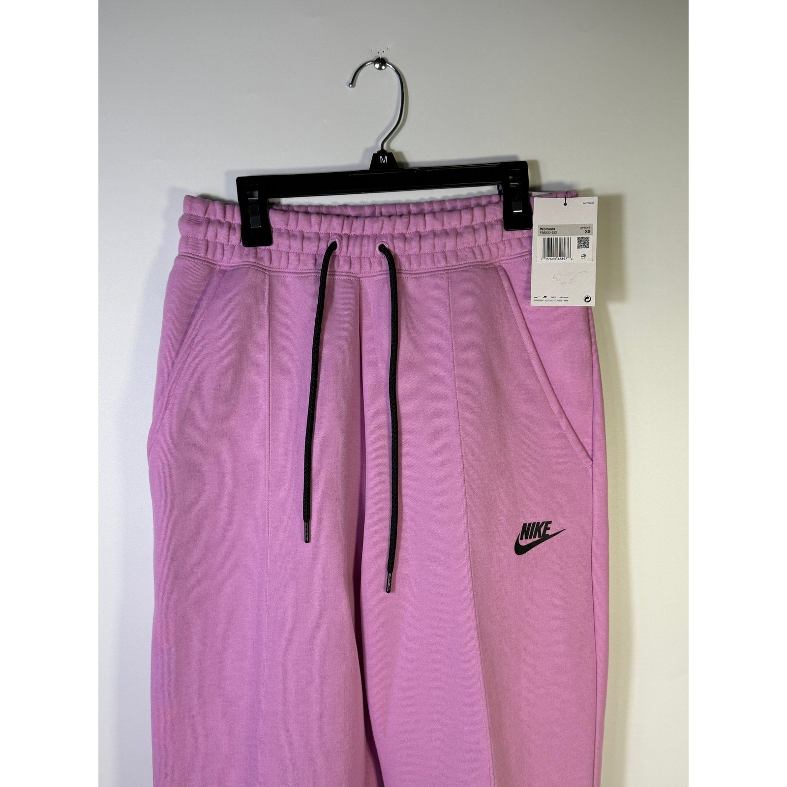 Nike Sportswear Phoenix Fleece Jogger Sweatpants for women, pink mid-rise, XS size, soft fleece fabric, relaxed fit.