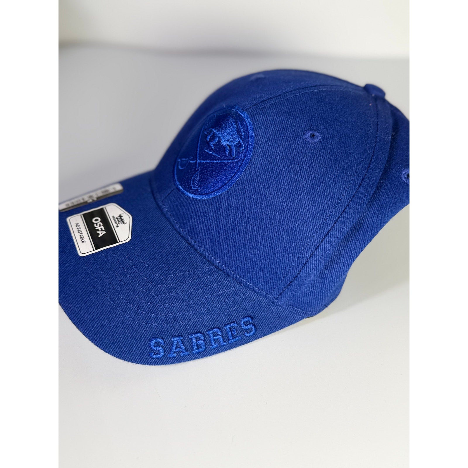 Fan Favorite Buffalo Sabres NHL tonal blue adjustable baseball cap with embroidered team logo and structured brim.