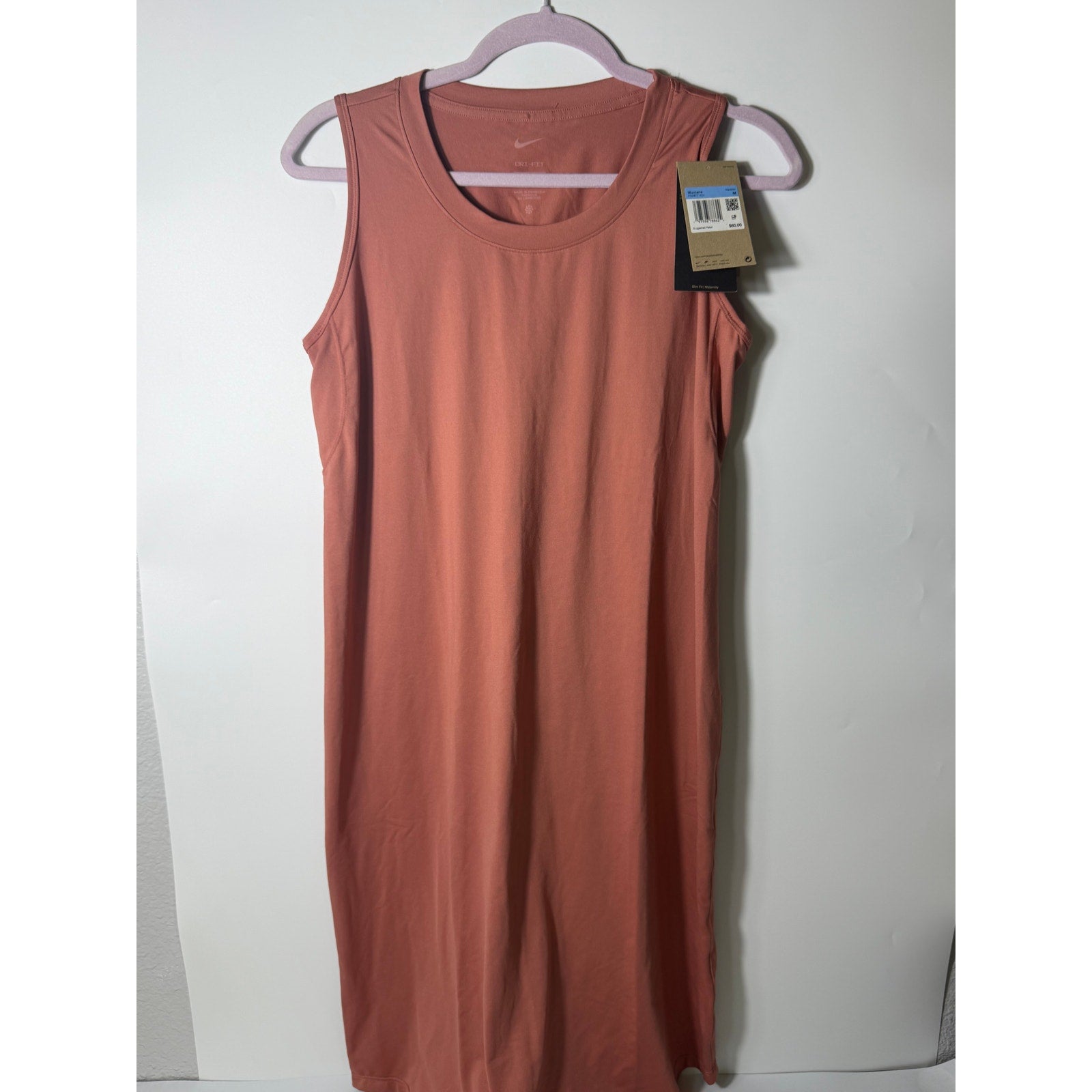 Nike Dri-FIT maternity sleeveless midi dress for women in pink, featuring a comfortable fit and athletic style.