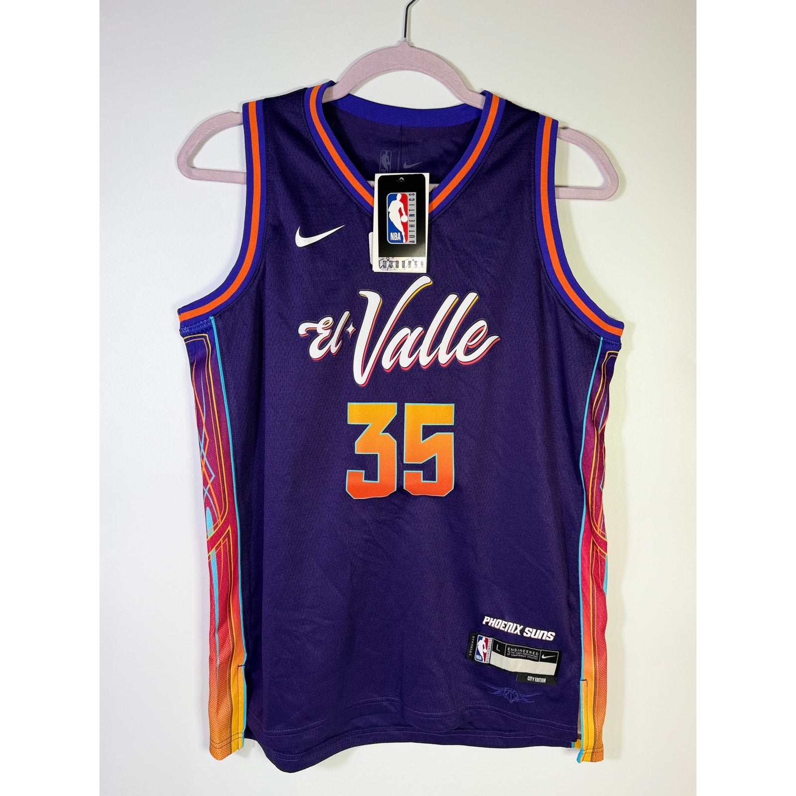 Nike Phoenix Suns Kevin Durant #35 youth city edition jersey, size 14/16, featuring team logo and Durant's name and number.