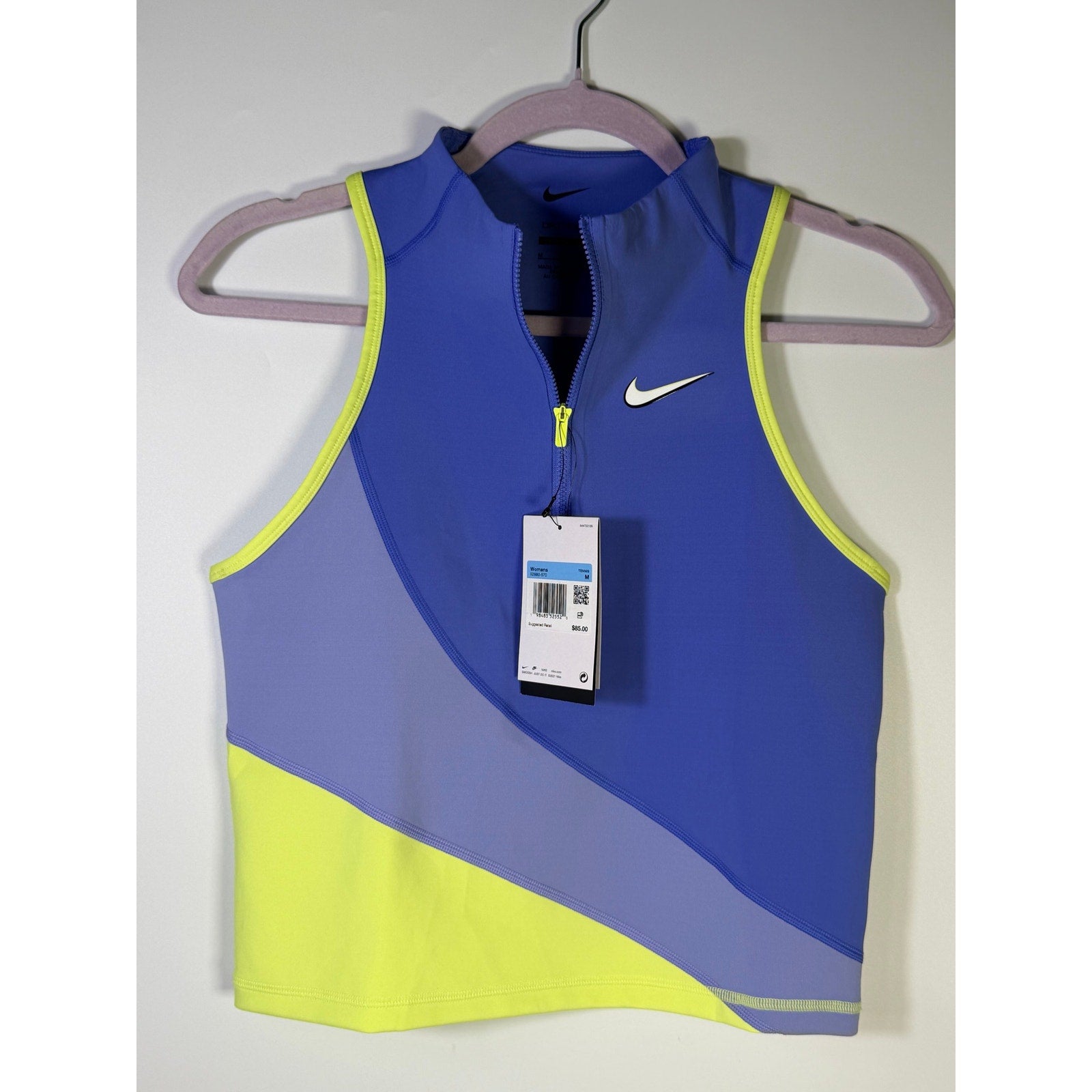 Nike women's sleeveless quarter-zip crop top in blue lime, size M, featuring a tank top style with Nike branding.