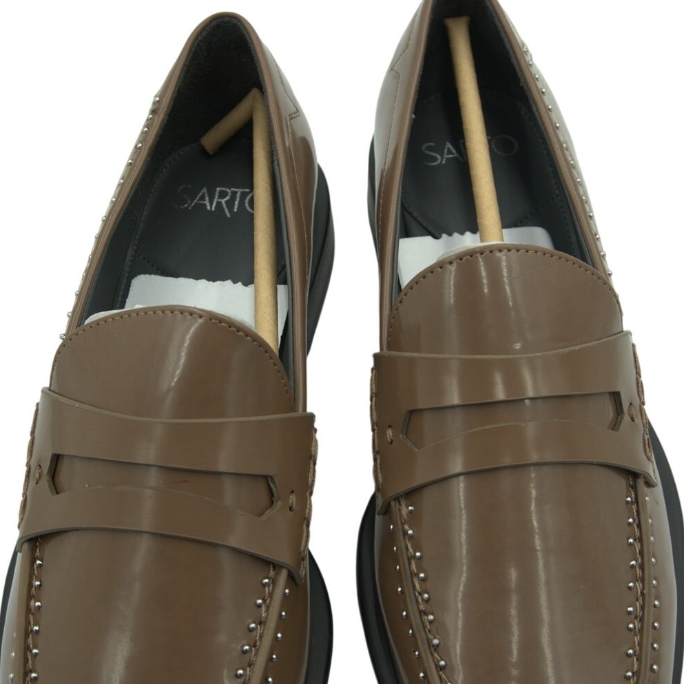 Brown Franco Sarto A-Eden studded flats for women, size 9M, featuring a slip-on design with studded detailing.
