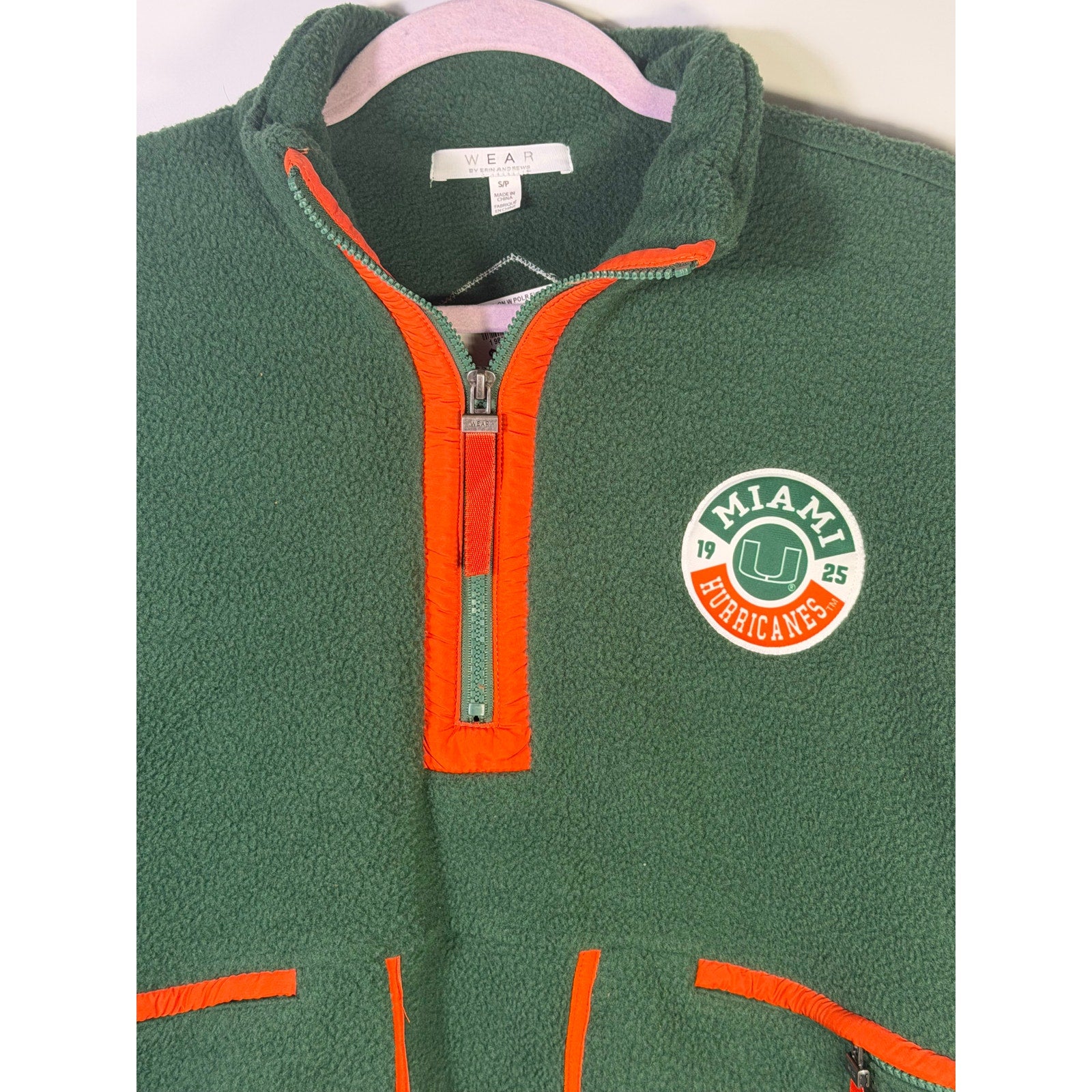 Wear by Erin Andrews women's green Miami Hurricanes quarter-zip fleece sweatshirt, size small, with logo and soft fleece material.