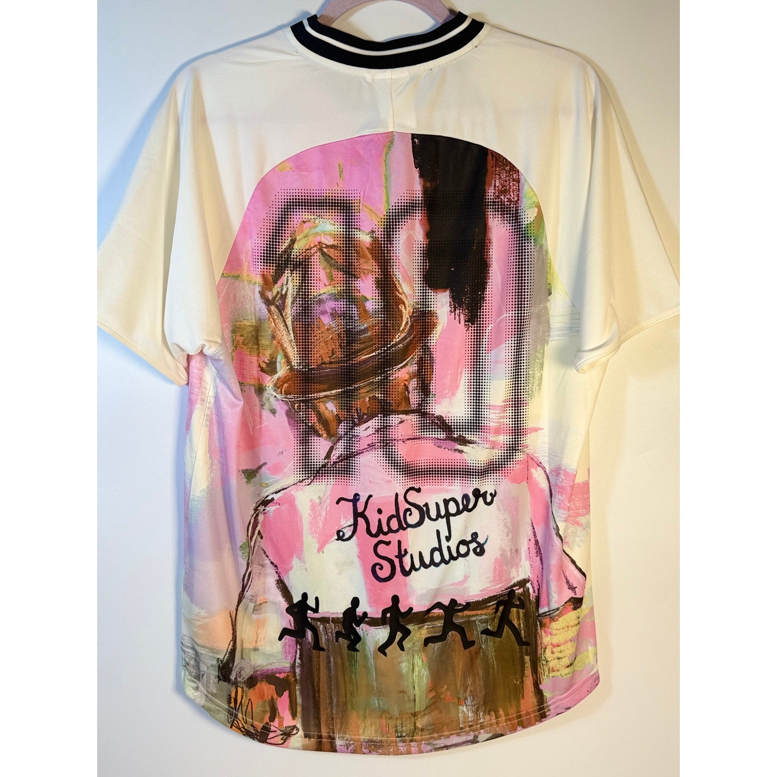 PUMA x KidSuper soccer jersey T-shirt in warm white with graphic design, men's size S, new with tags.