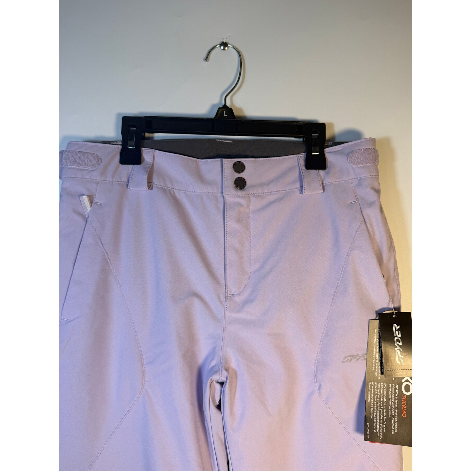 Spyder Women's Olympia ski snow pants in lavender, size 16, with EXO Tech and Thermo insulation, shown in image.