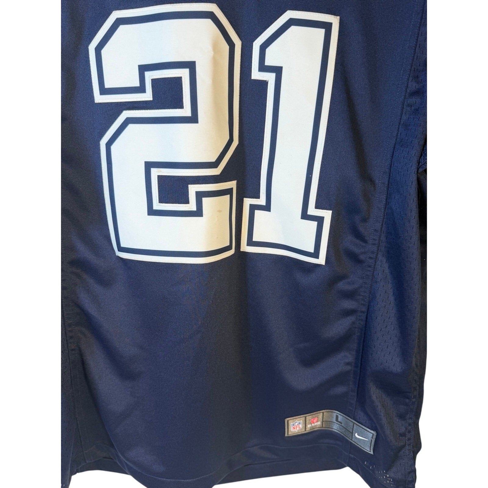 Nike Dallas Cowboys Ezekiel Elliott #21 NFL game jersey for men, large size, navy color, featuring team logo and player number.