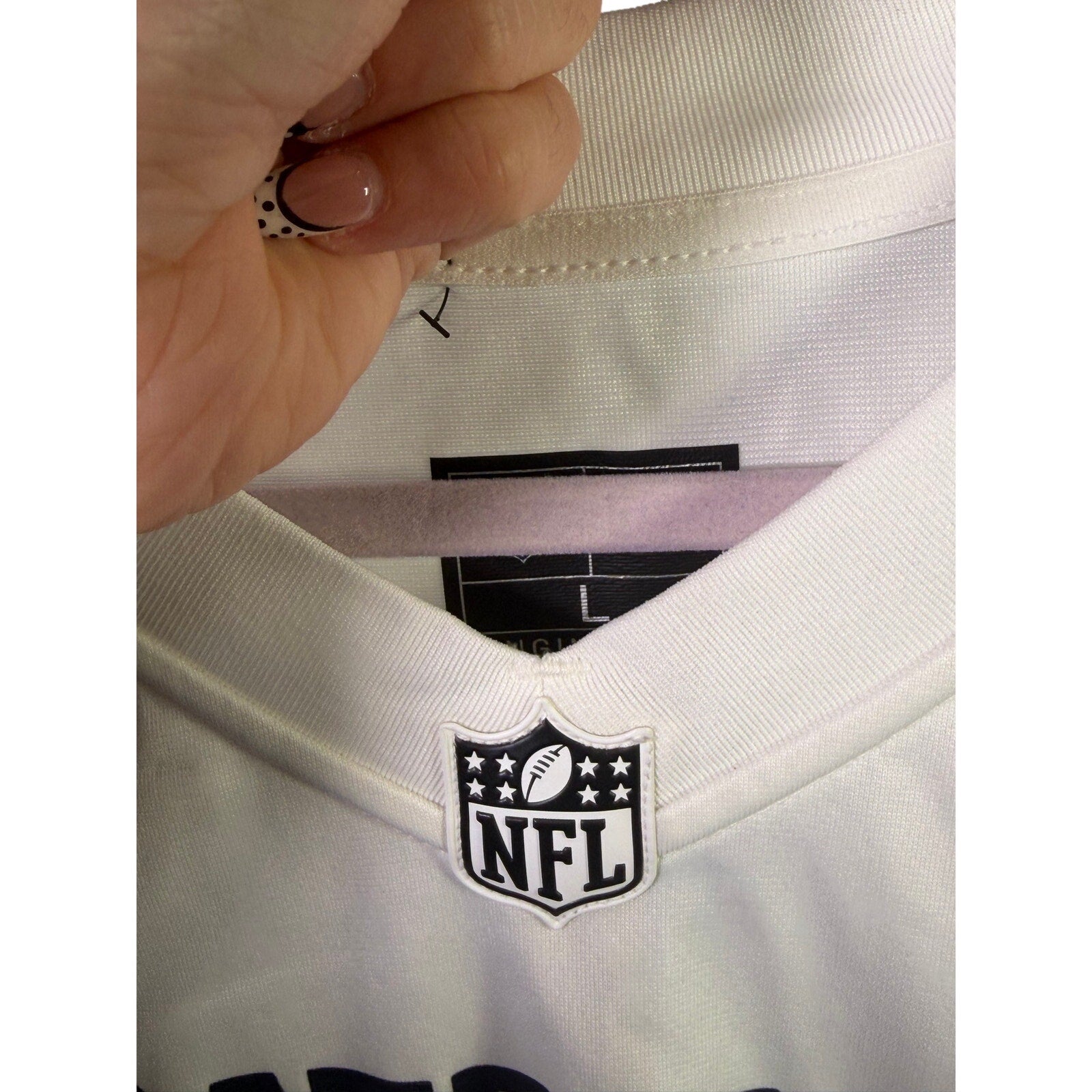 Nike NFL New England Patriots Drake Maye #10 white jersey for men, large size, featuring team logo and player number on the front.