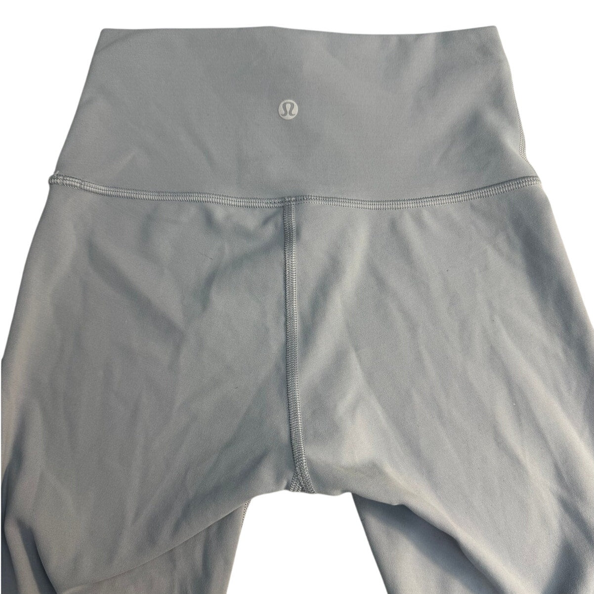 Lululemon Align high-rise crop leggings in pastel blue, size 4, showing the soft, stretchy fabric and sleek design.