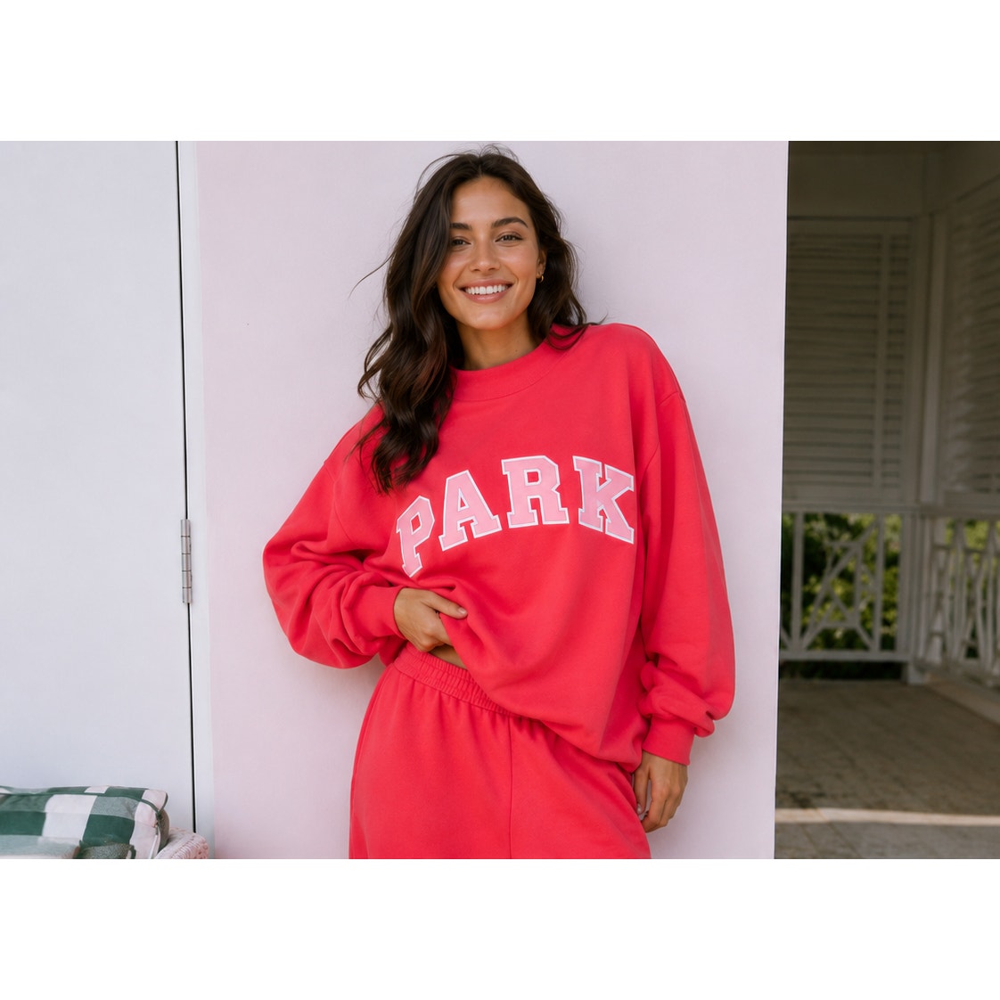 Pink PARKE Heritage Varsity Mockneck Sweatshirt for women, showing the pullover with a relaxed fit and varsity-style design.