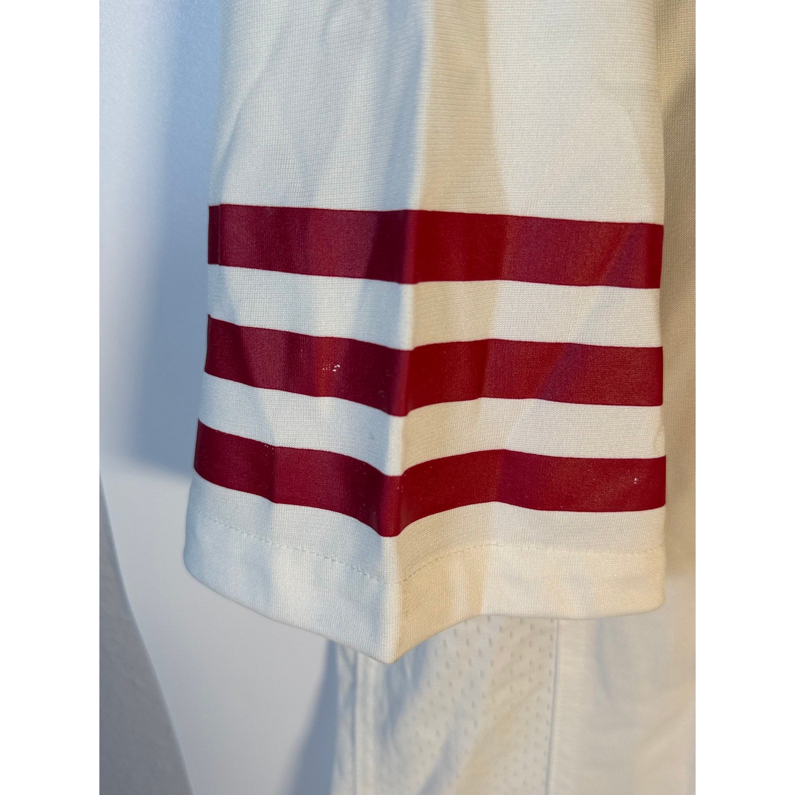 Nike Christian McCaffrey #23 San Francisco 49ers white NFL jersey for men, size large, with team logo and player number.