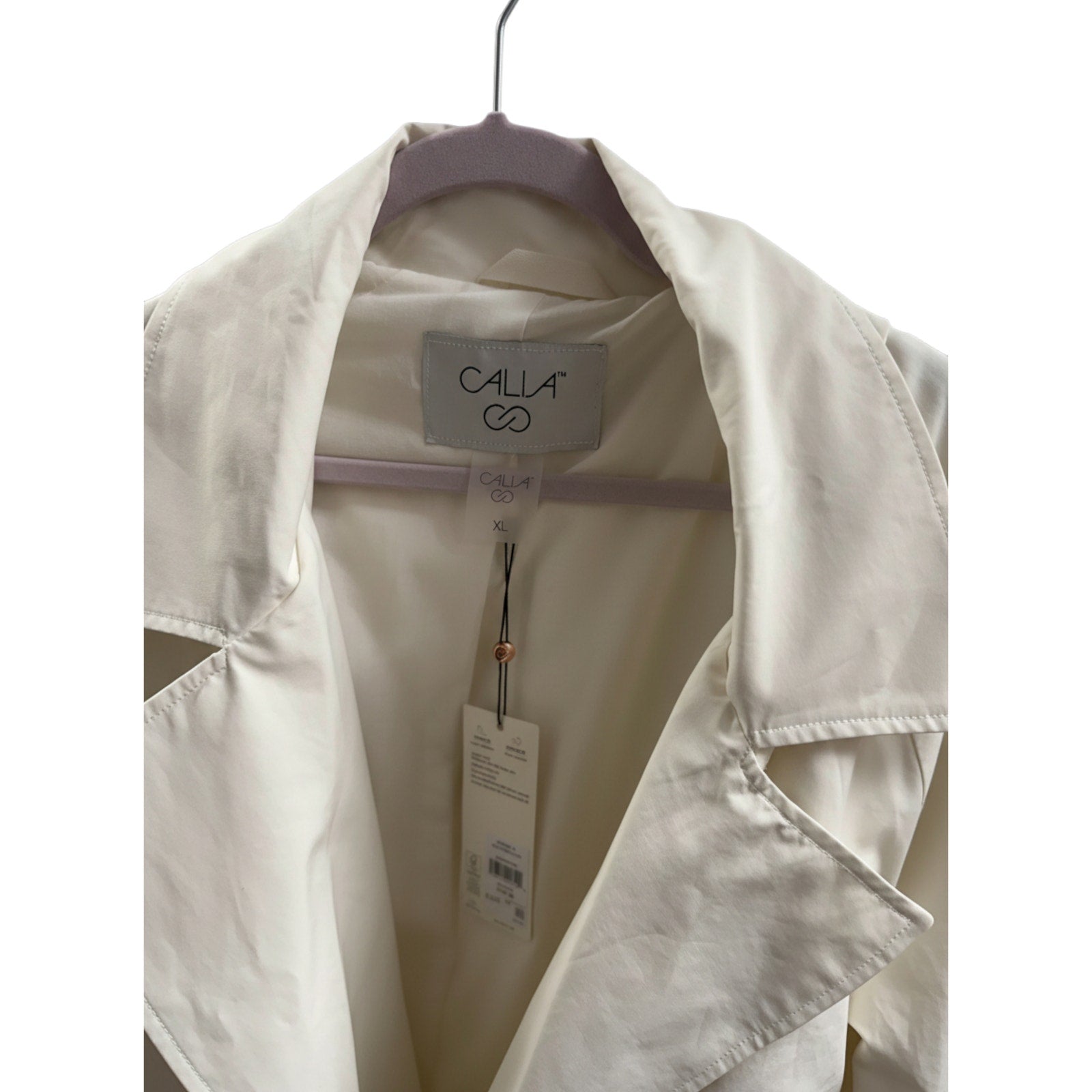 Calia women's hooded trench coat in cream, lightweight belted jacket, front view, showing hood and waist belt.